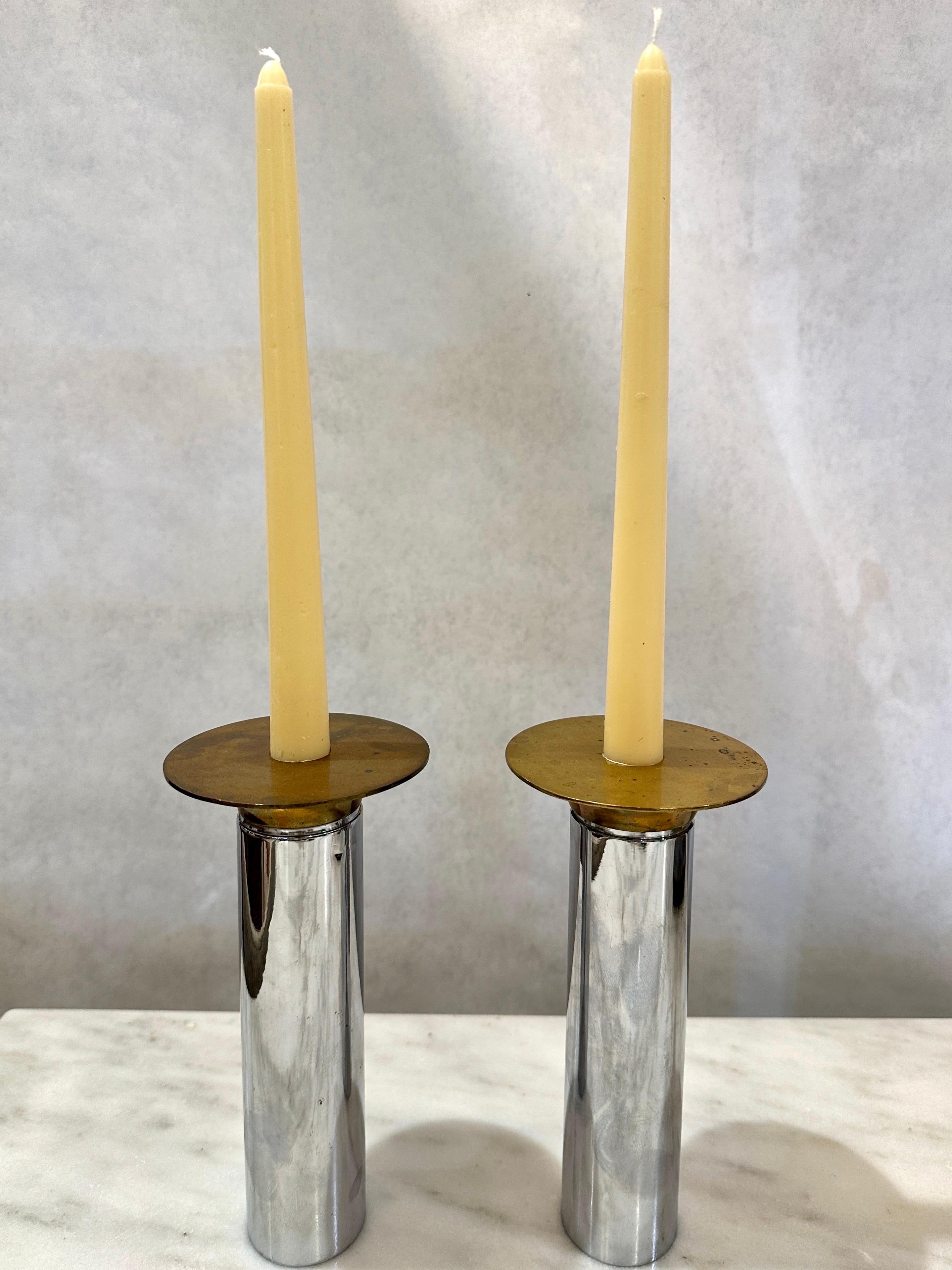 EXTRA Rare Pair of Torben Ørskov candle holders in mixed-metals (patinaed brass and nickel).  The candle holders are designed by Danish designer, Torben Ørskov In solid brass and nickel.  This model is not a very common model and only one candle