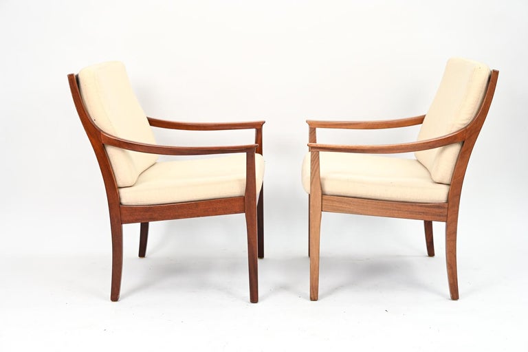 Pair of Torbjørn Afdal Mahogany Lounge Chairs In Good Condition For Sale In Norwalk, CT