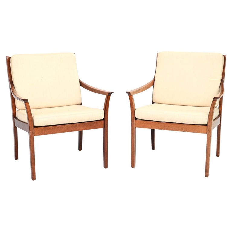 Pair of Torbjørn Afdal Mahogany Lounge Chairs For Sale