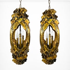 Pair of Torch Cut Brass Brutalist Chandeliers by Tom Greene for Feldman