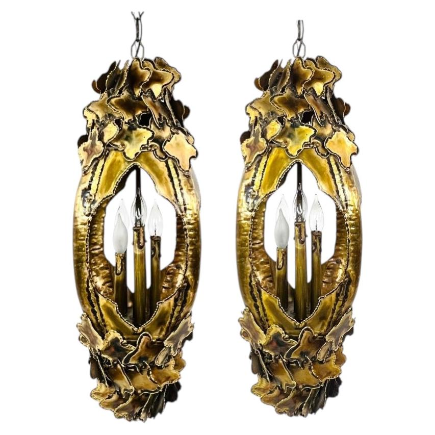 Pair of Torch Cut Brass Brutalist Chandeliers by Tom Greene for Feldman For Sale