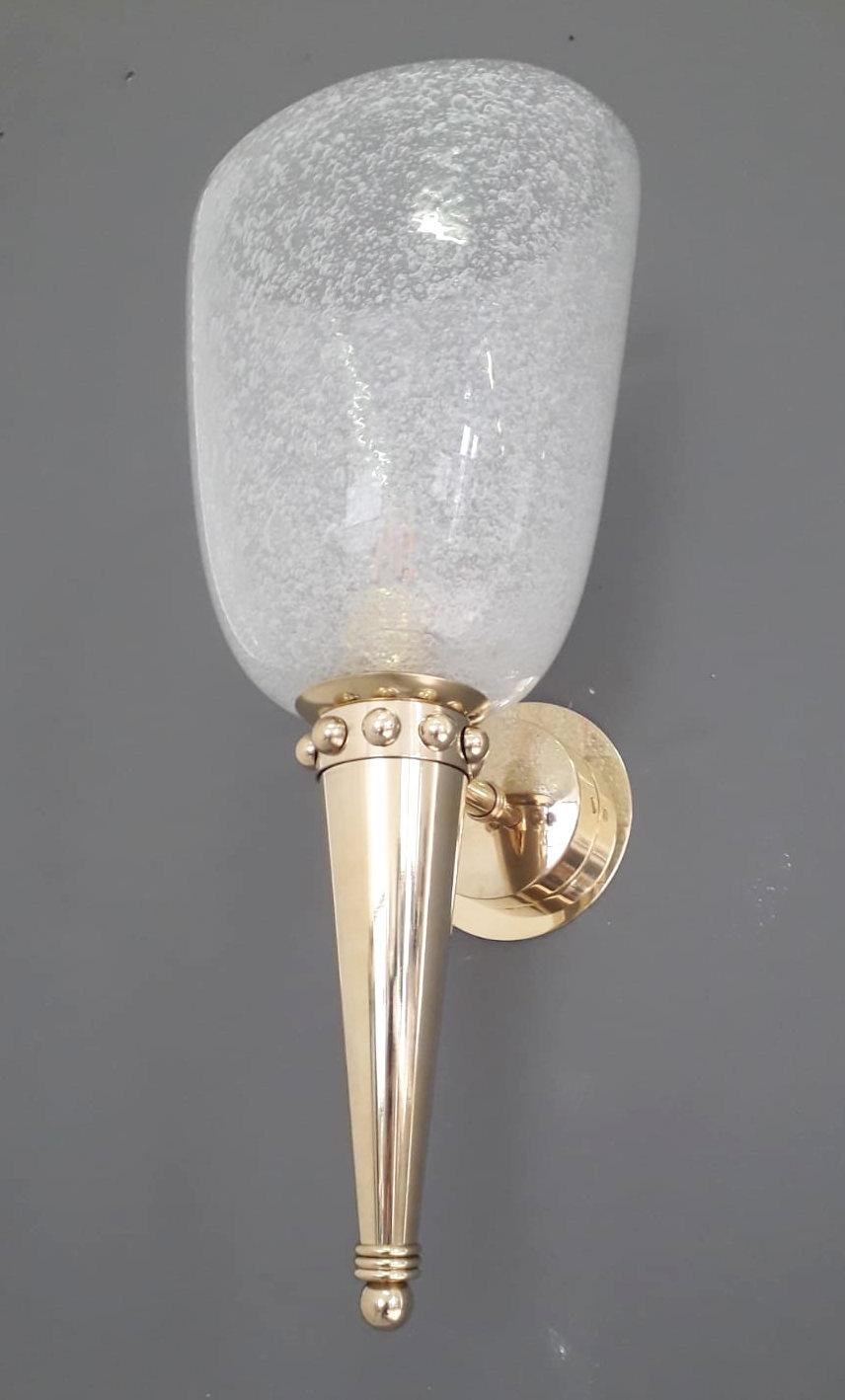 Vintage Italian torchere wall lights with Murano glass cups hand blown with bubbles inside the glass using bollicine technique, mounted on brass frames, made in Italy by Barovier et Toso, circa 1950s
Original mark on the backplate
Measures: Height
