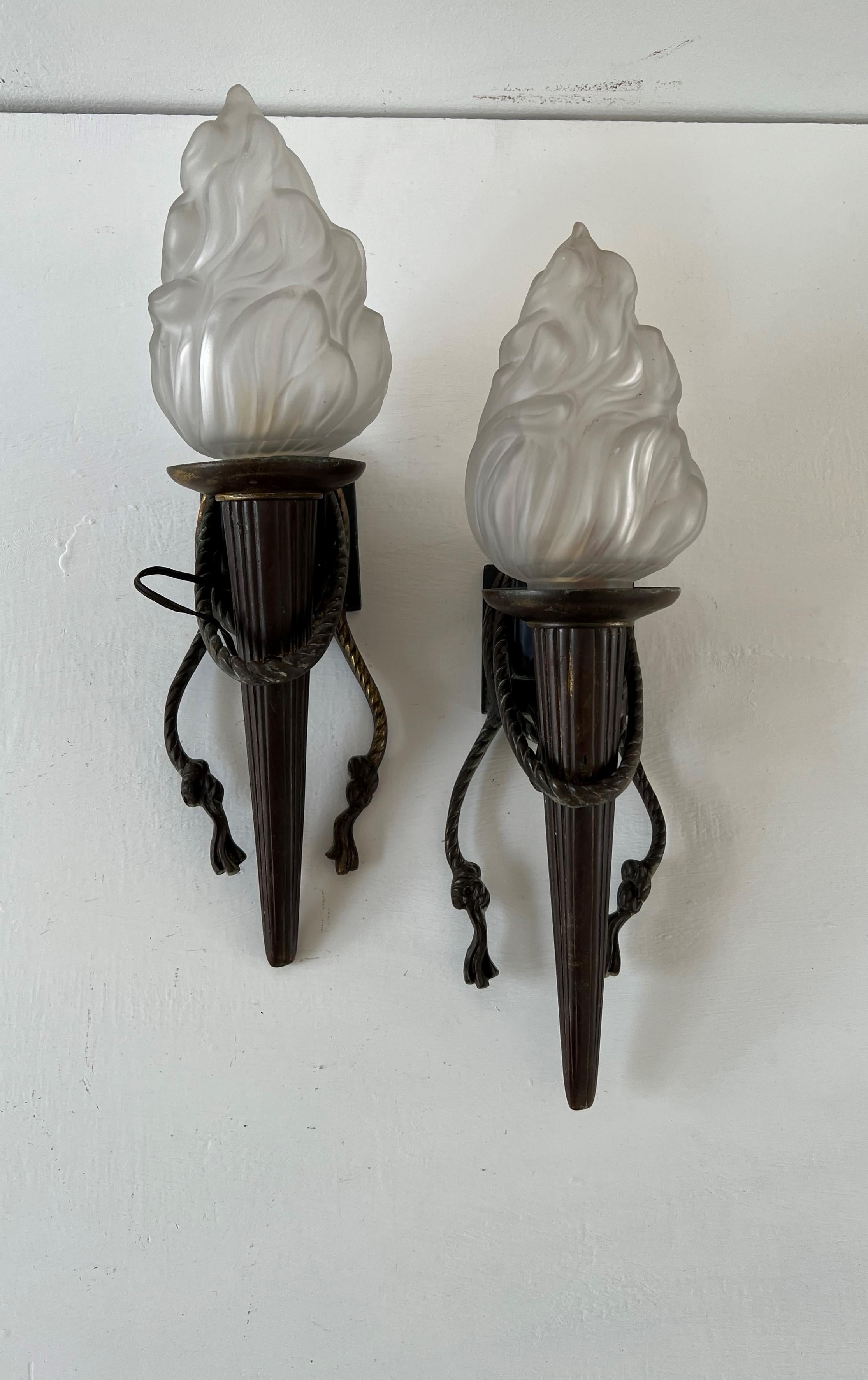 French Pair of Torch Sconces in Bronze and Pressed Glass, France, circa 1940s For Sale
