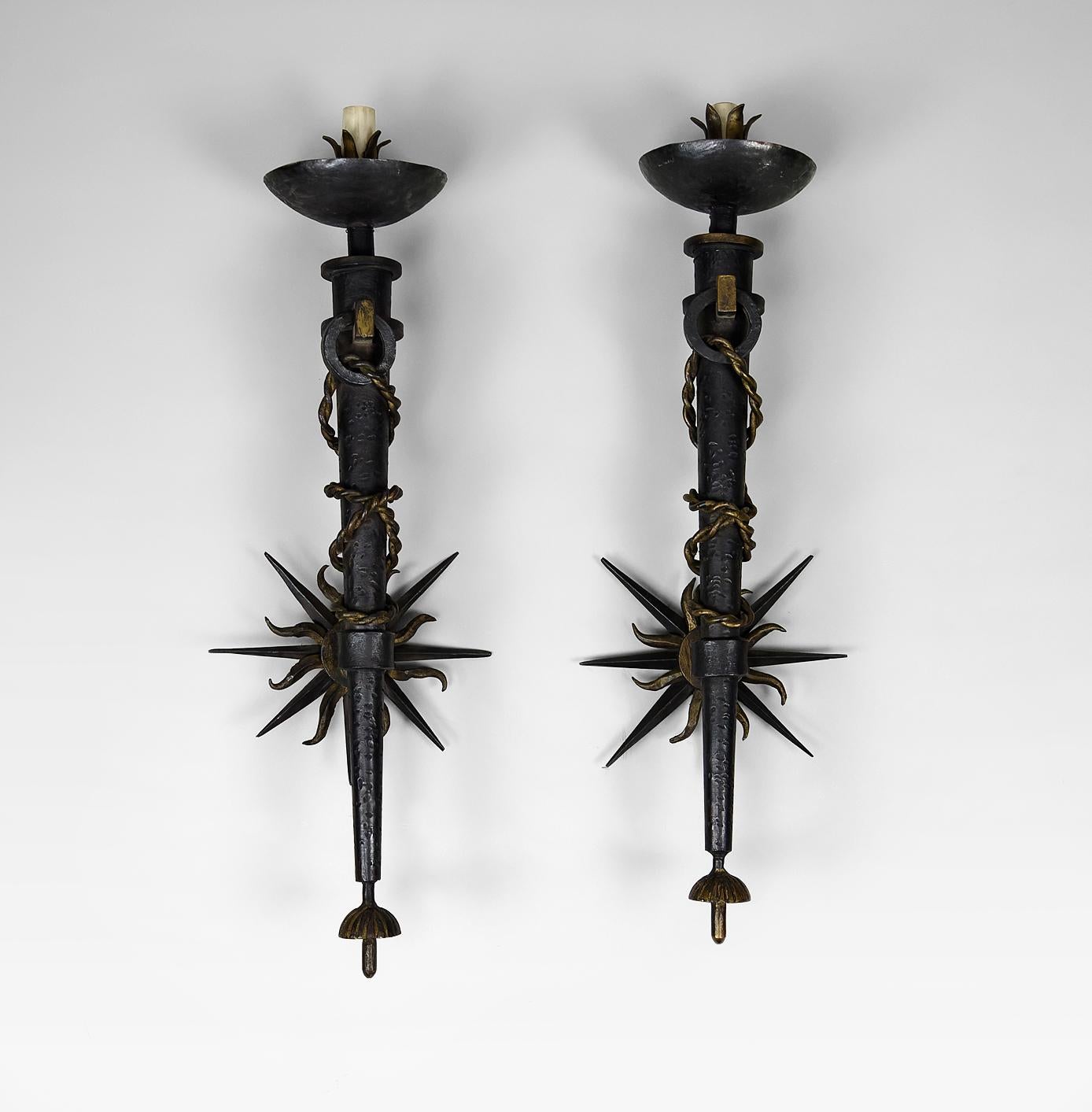 Art Deco Pair of torchiere sconces in wrought iron by Gilbert Poillerat, France, 1940's For Sale