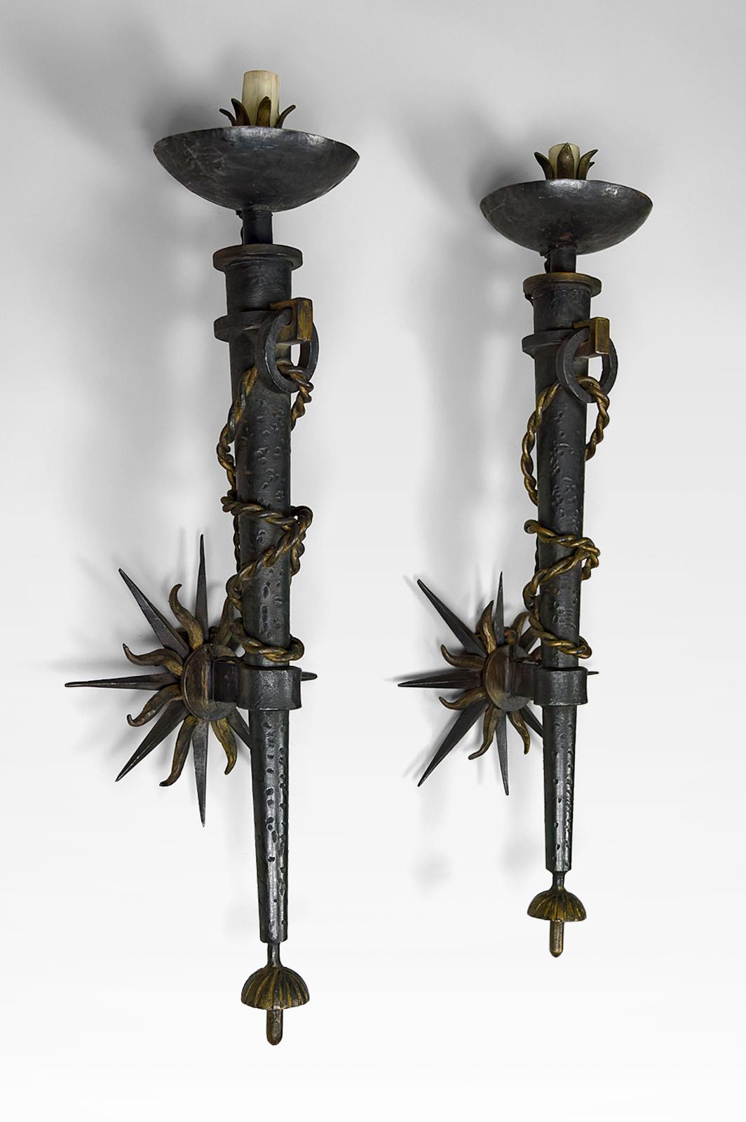 Gilt Pair of torchiere sconces in wrought iron by Gilbert Poillerat, France, 1940's For Sale