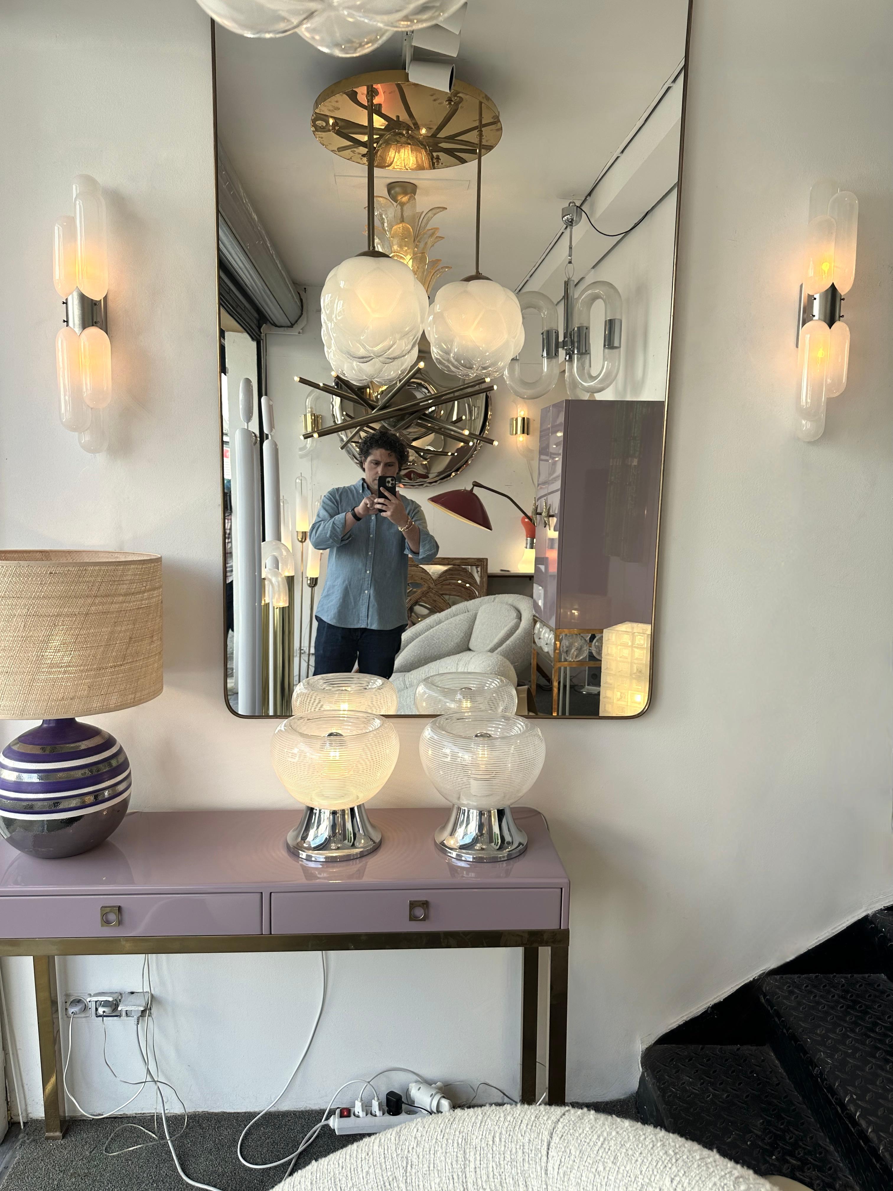 Mid-Century Modern Space Age Pair of gellule torpedo wall lamps lights lightning sconces by Carlo Nason for the manufacture Mazzega, blown white smoke Murano glass, silver metal structure. Famous manufacture like Venini, Vistosi, La Murrina, VeArt,
