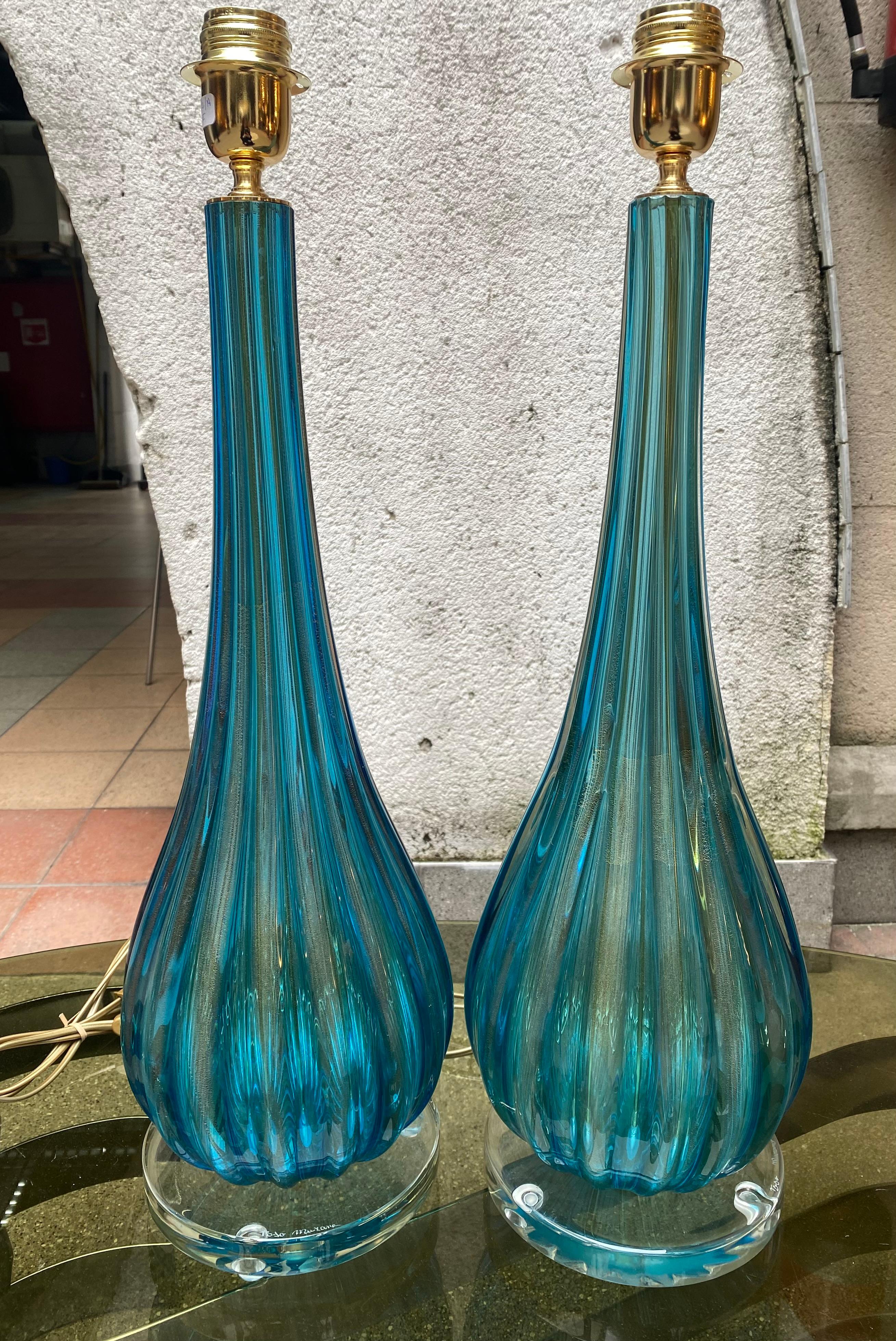Pair of Toso Murano lamps 
Murano glass 
Blue and gold 
Dimensions : h62xl20cm
ref : c/1942/2/A
Price : 3200€ for the pair.