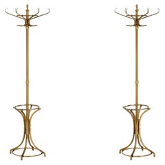 Coppia di appendiabiti tradizionali, finitura ottone antico.