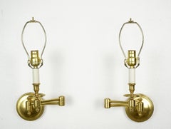 Pair of Traditional Swing Arm Polished Brass Wall Sconces