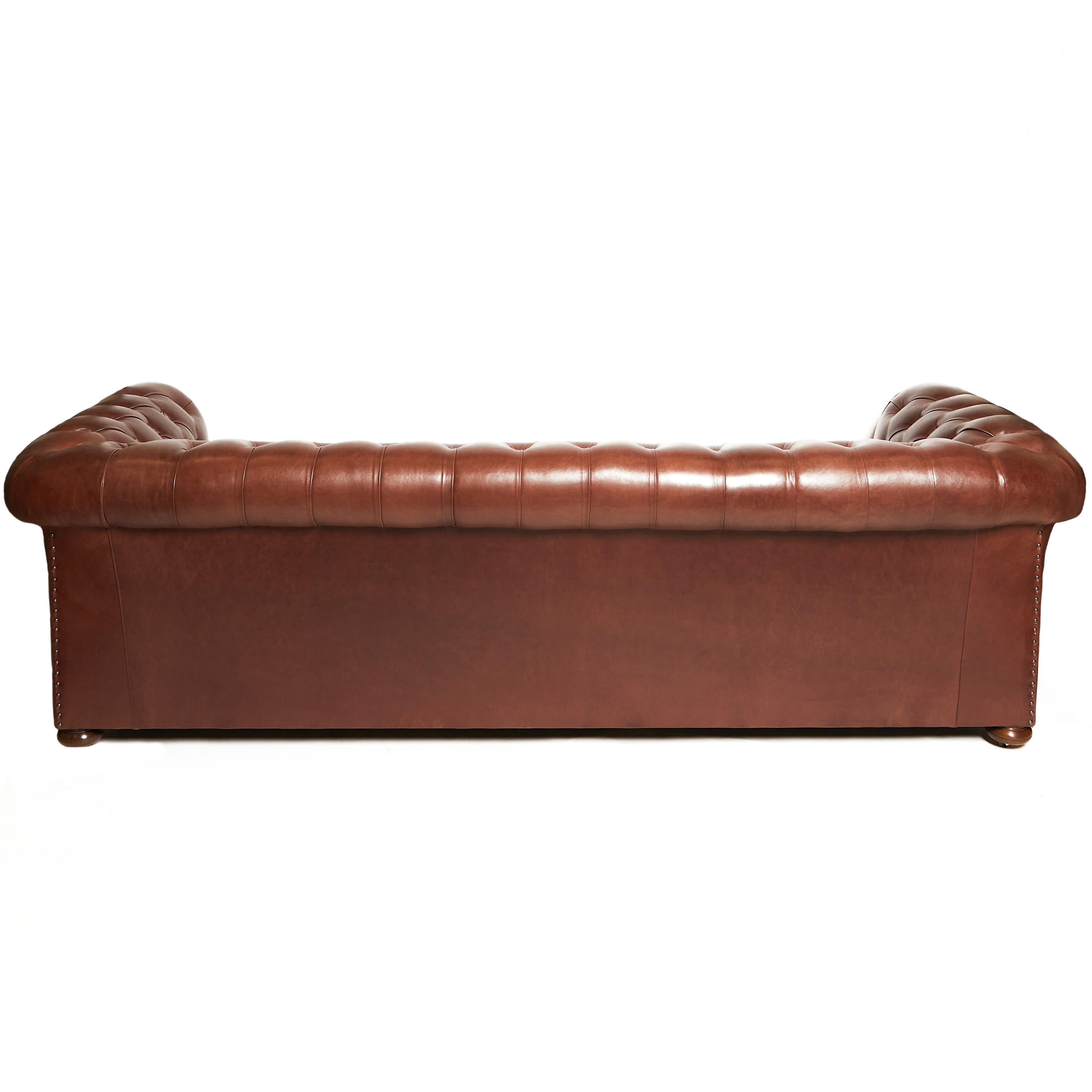 Contemporary Pair of Traditionally Designed Large Chesterfield Leather Sofas