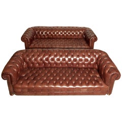 Pair of Traditionally Designed Large Chesterfield Leather Sofas