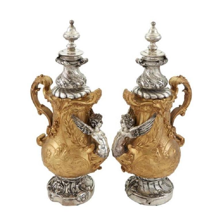 Pair of Transitional Louis XV/XVI Style Silvered and Gilt-Bronze Ewers