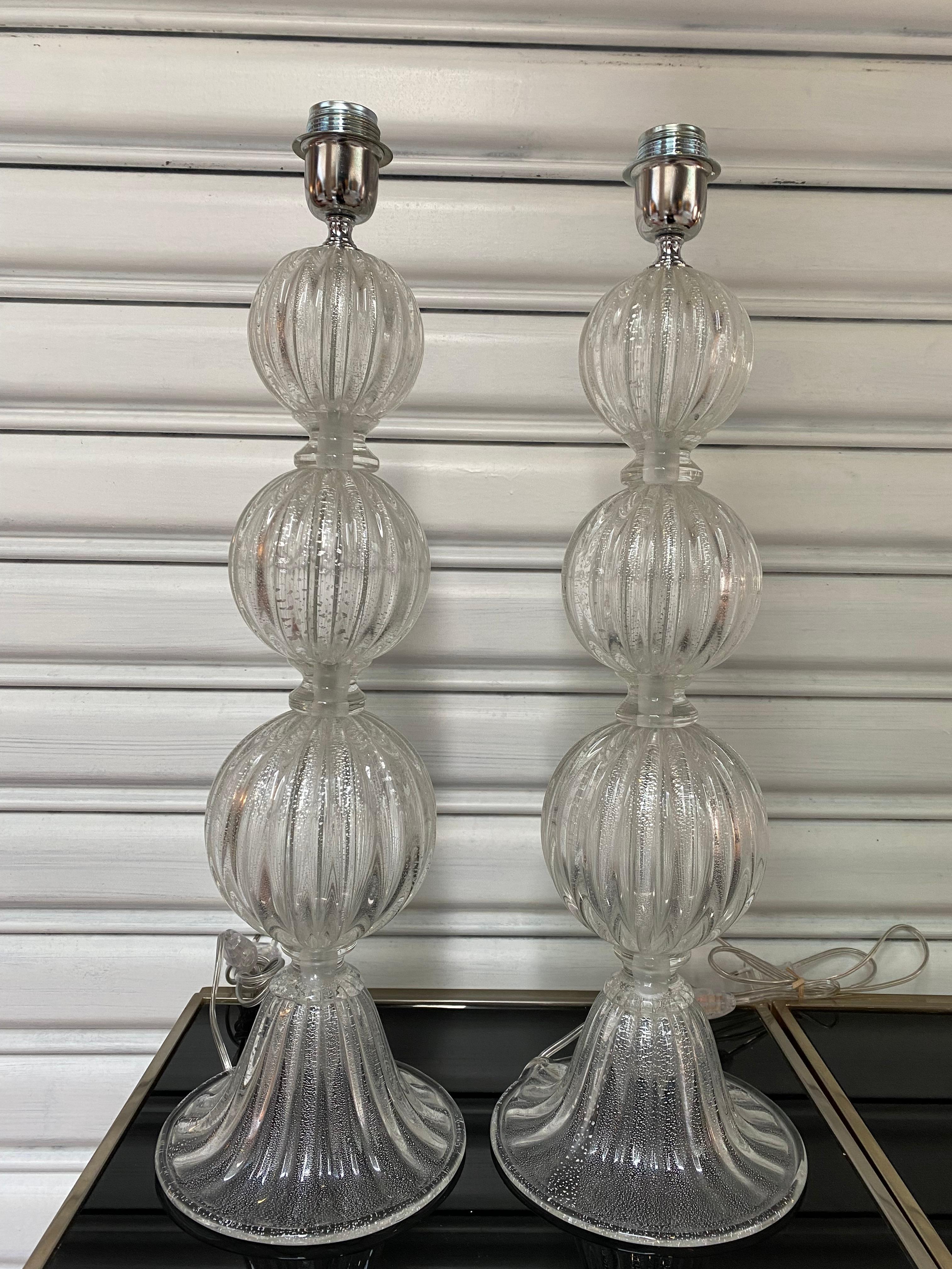 Pair of transparent lamps Alberto Dona Murano (1 and 2 )
Circa 1970
Signed on the foot 
Dimensions : H 62 x 18.5cm
Ref : c/1928/2
Price :3500 € for the pair.
 