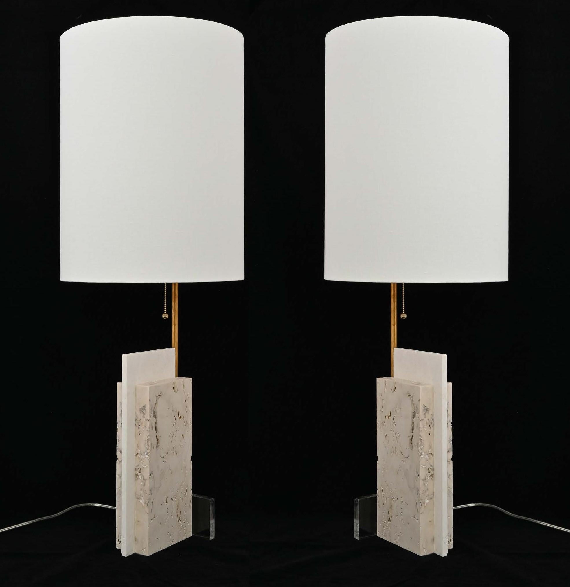 Elegant pair of modern craftsman table lamps in travertine and acrylic featuring a sober, minimal design focusing on the simplicity and luxury of the materials.

The overall measurement of 36 H x 13 W x 13 D. The shade is 13 W x 17 H. The marble
