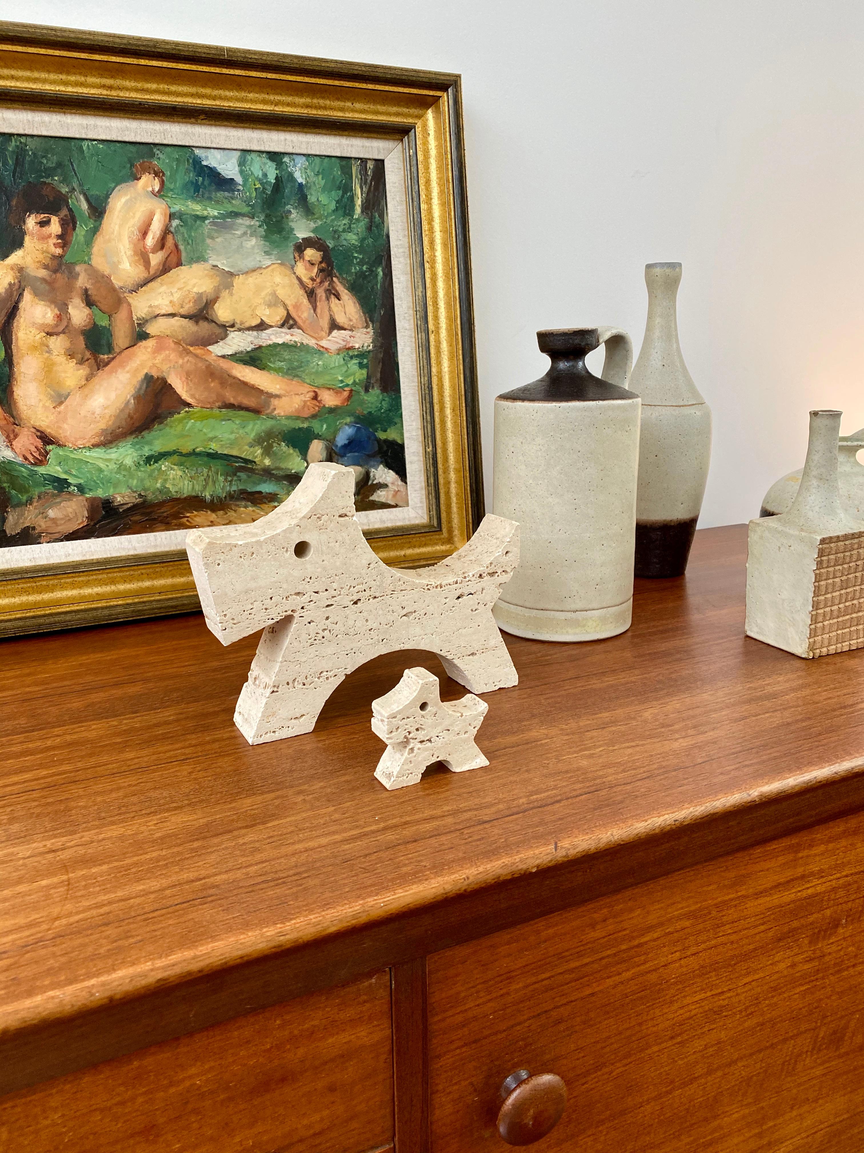 Pair of stylised travertine Scottish Terriers by Mannelli brothers (circa 1970s). Designed by Italians, Fratelli Mannelli, this charming set has loads of character and will delight collectors of beautiful objects. They are not only visually alluring