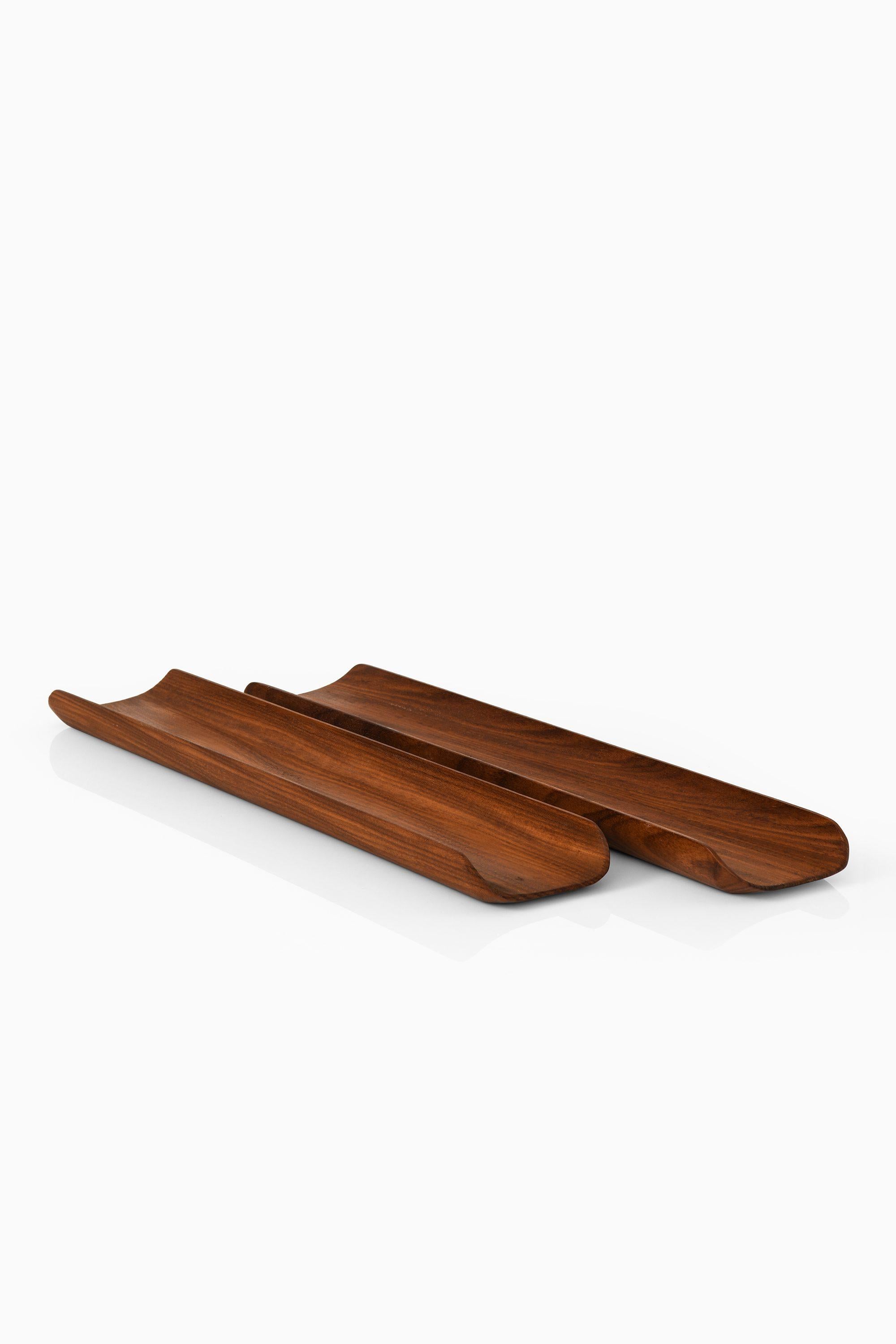 Pair of Trays in Teak By Johnny Mattsson, 1960's

Additional Information:
Material: Teak
Style: Mid century, Scandinavian
Produced by Upsala Slöjd in Sweden
Dimensions (W x D x H): 60 x 10.5 x 3.5 cm
Condition: Good vintage condition, with minor
