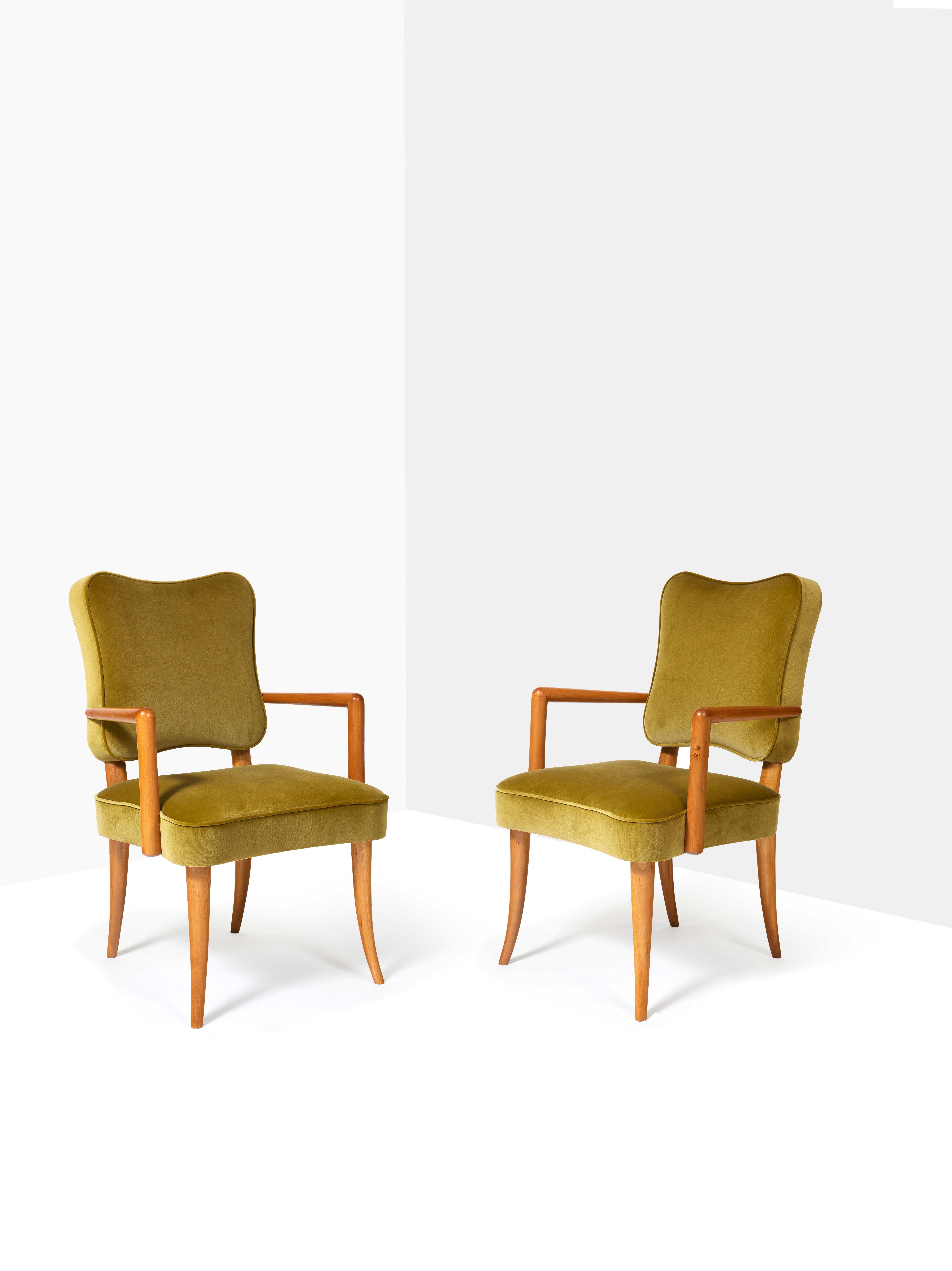 Pair of sycamore armchairs with cloverleaf back and curved tapered legs, covered with almond green mohair.