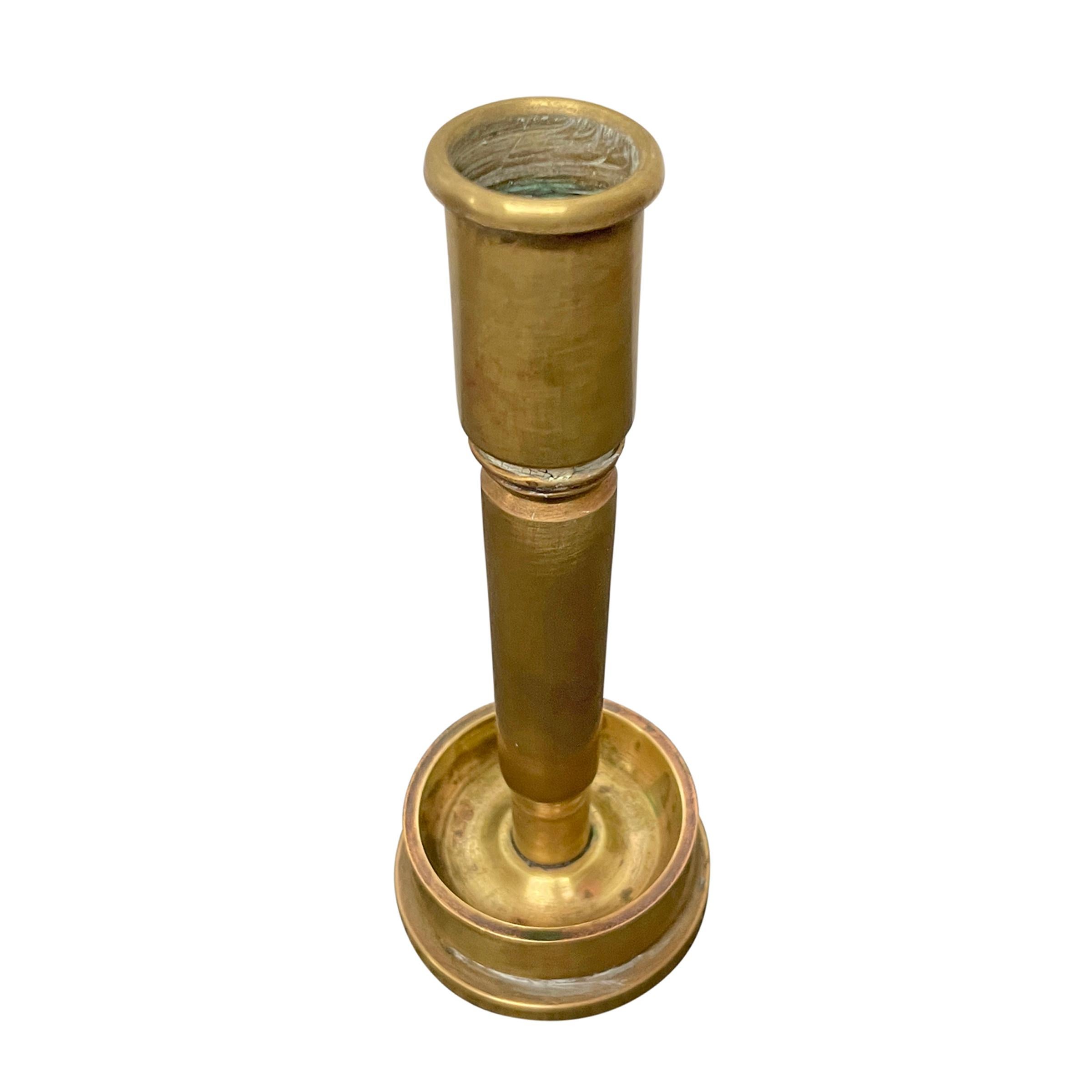 spent brass candle