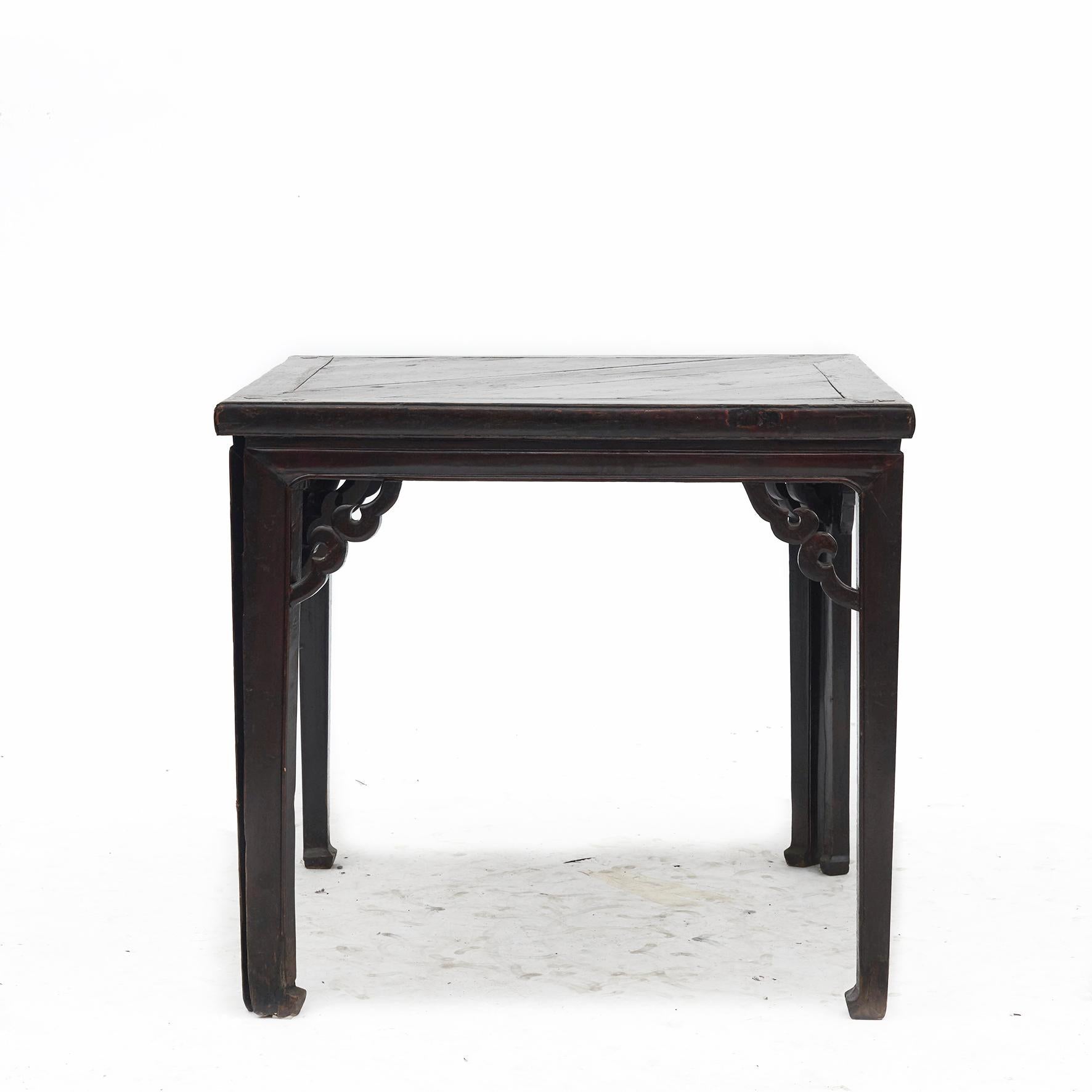 Pair of rare console tables in triangular shape. Original dark burgundy lacquer with natural patina.
Highlighted with a clear lacquer surface finish.

Presumably Shanxi Province. China, 1800 - 1840.

Can be used as: Consoles possibly to corners or