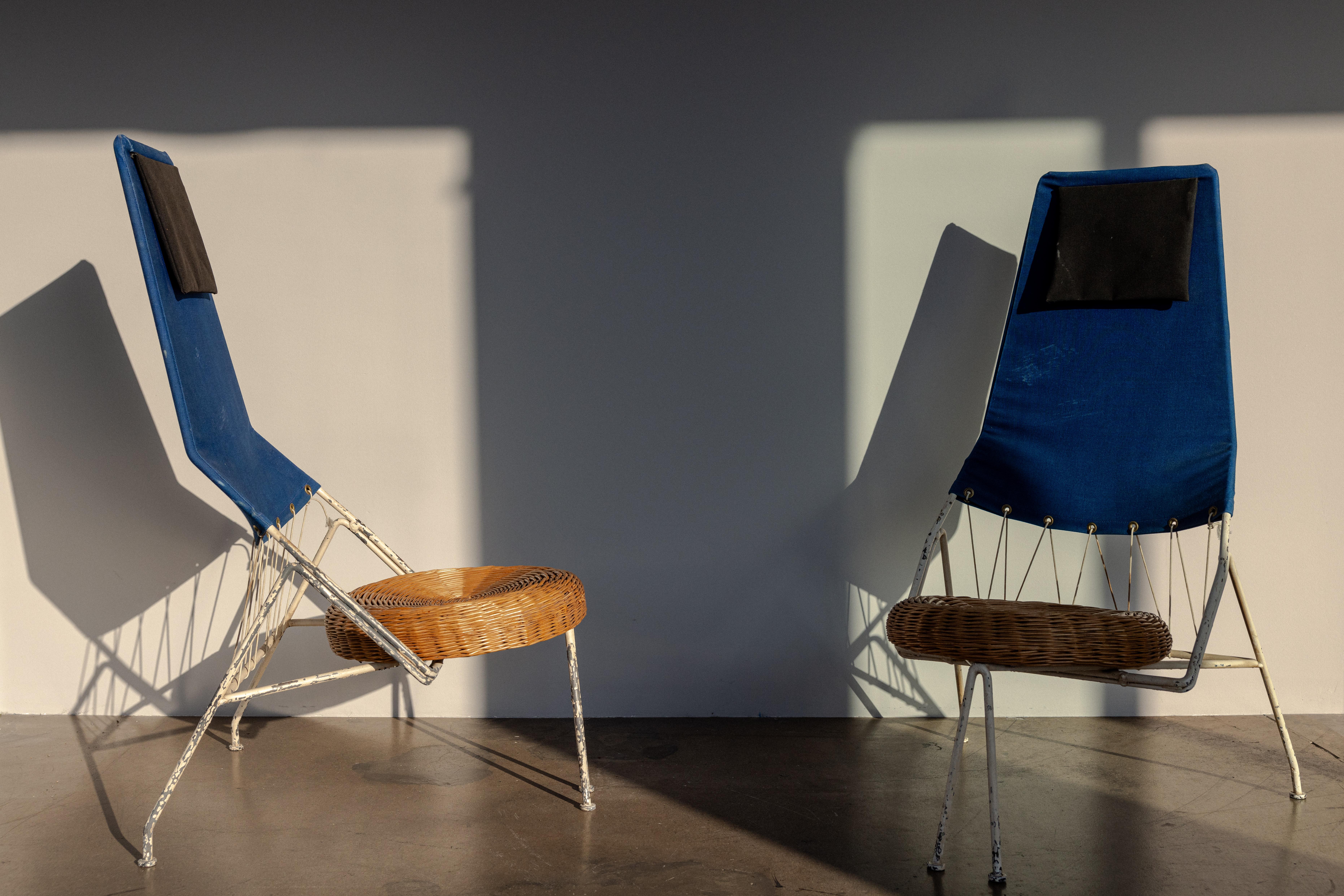 Pair of Triangular Lounge Chairs by Tony Paul, c. 1954, USA
Enameled Steel with Canvas and Rattan Seats

H 42