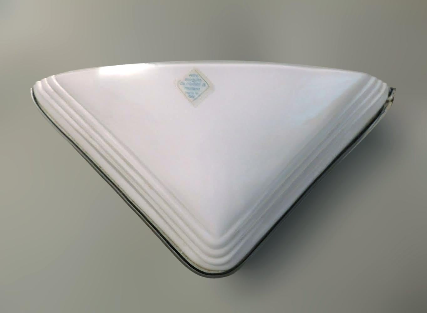 Vintage Art Deco style Italian wall light with triangular milky white Murano glass shade / Made in Italy, circa 1960s
Measures: width 14 inches, height 7.5 inches, depth 5 inches
1 light / E26 or E27 type / max 60W
1 pair available in stock in