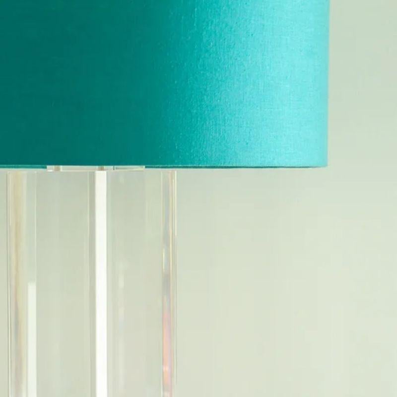 A pair of lucite triangular lamps on triangular bases with lucite finials, 1970s.

Light scratches to the lucite

Additional Information:
Materials: Lucite
Dimensions: 44 D x 44 W x 80 H cm
Base Dimensions: 25.5 cm.