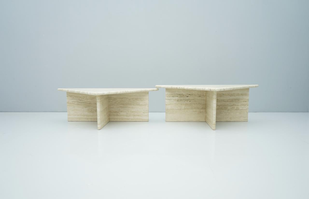 Pair of triangular travertine side or coffee table Italy 1970s in different height.

Very good condition.