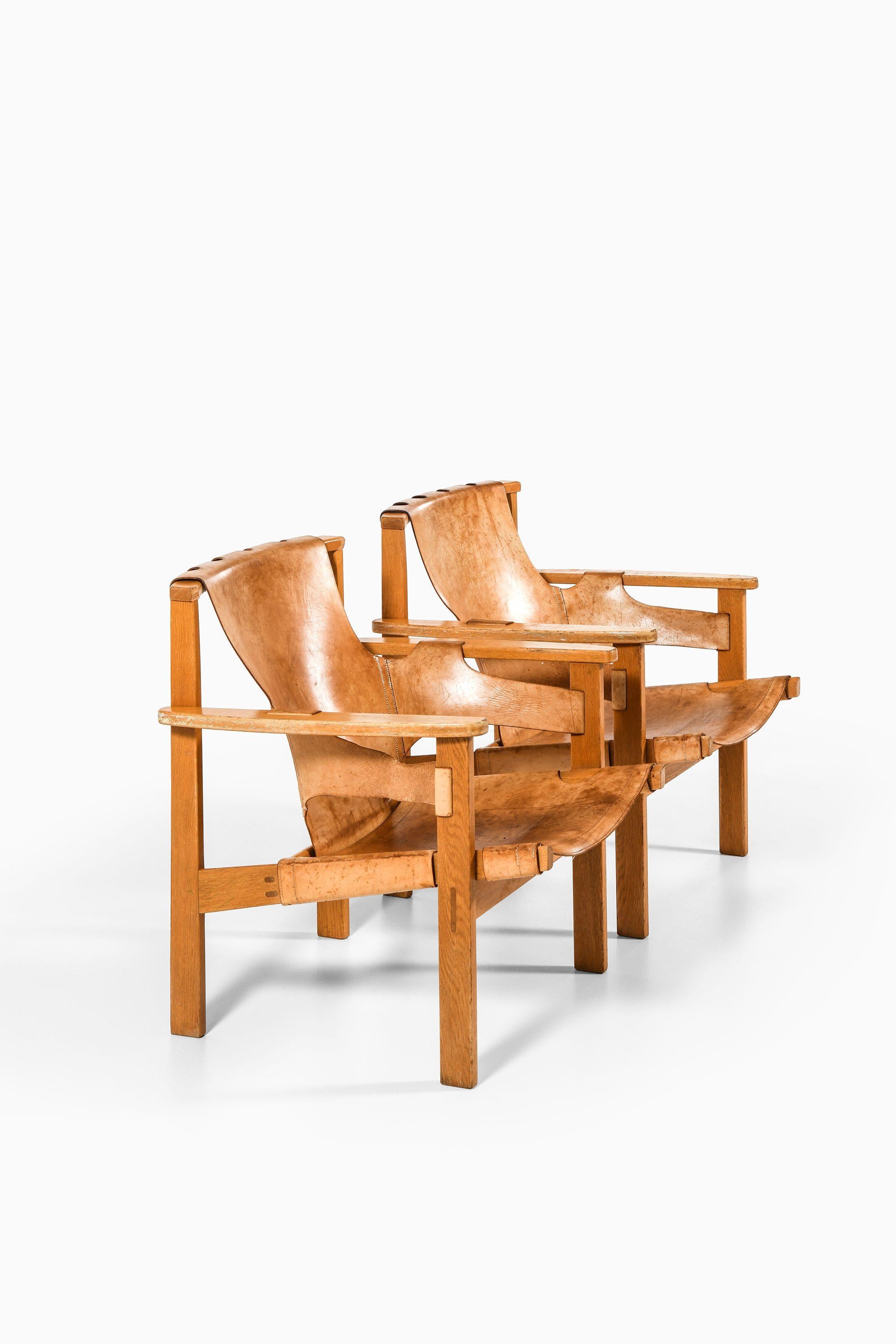 Swedish Pair of Trienna Easy Chairs in Oak & Original Leather by Carl-Axel Acking, 1957
