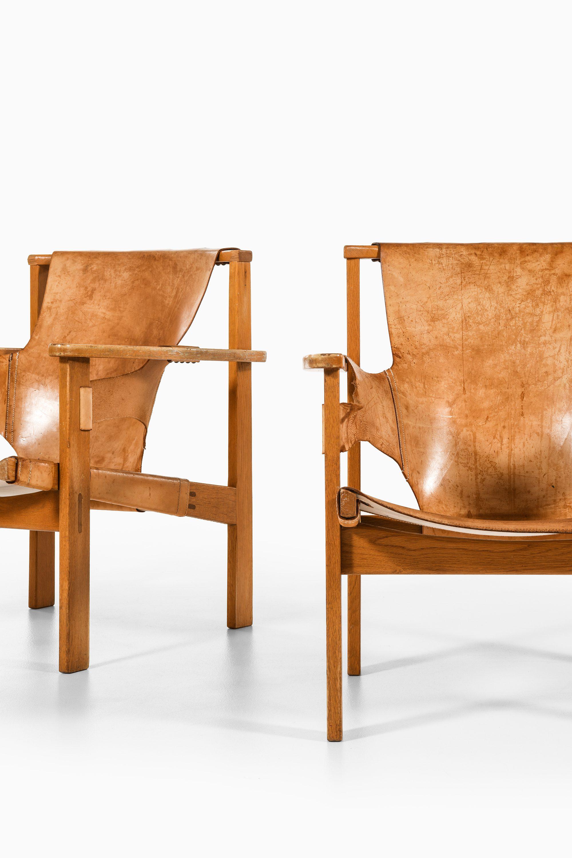 20th Century Pair of Trienna Easy Chairs in Oak & Original Leather by Carl-Axel Acking, 1957 For Sale