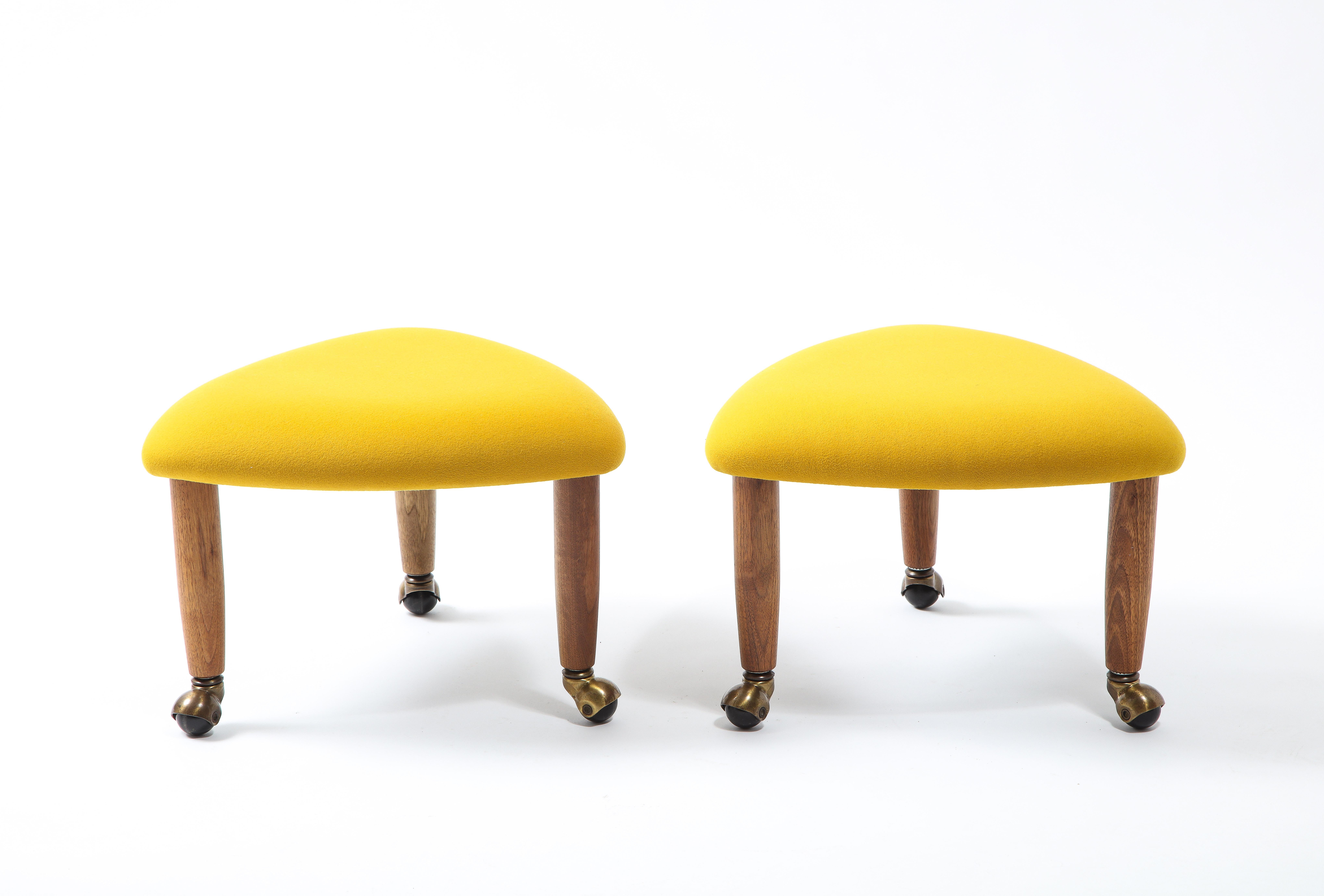 Pristine pair of original Trifecta stools on ball castors by Adrian Pearsall Craft Associates. 

The subtle and soft geometric form paired with the bright, eye-catching hue makes this pair of stools a special and unique accessory to any room.