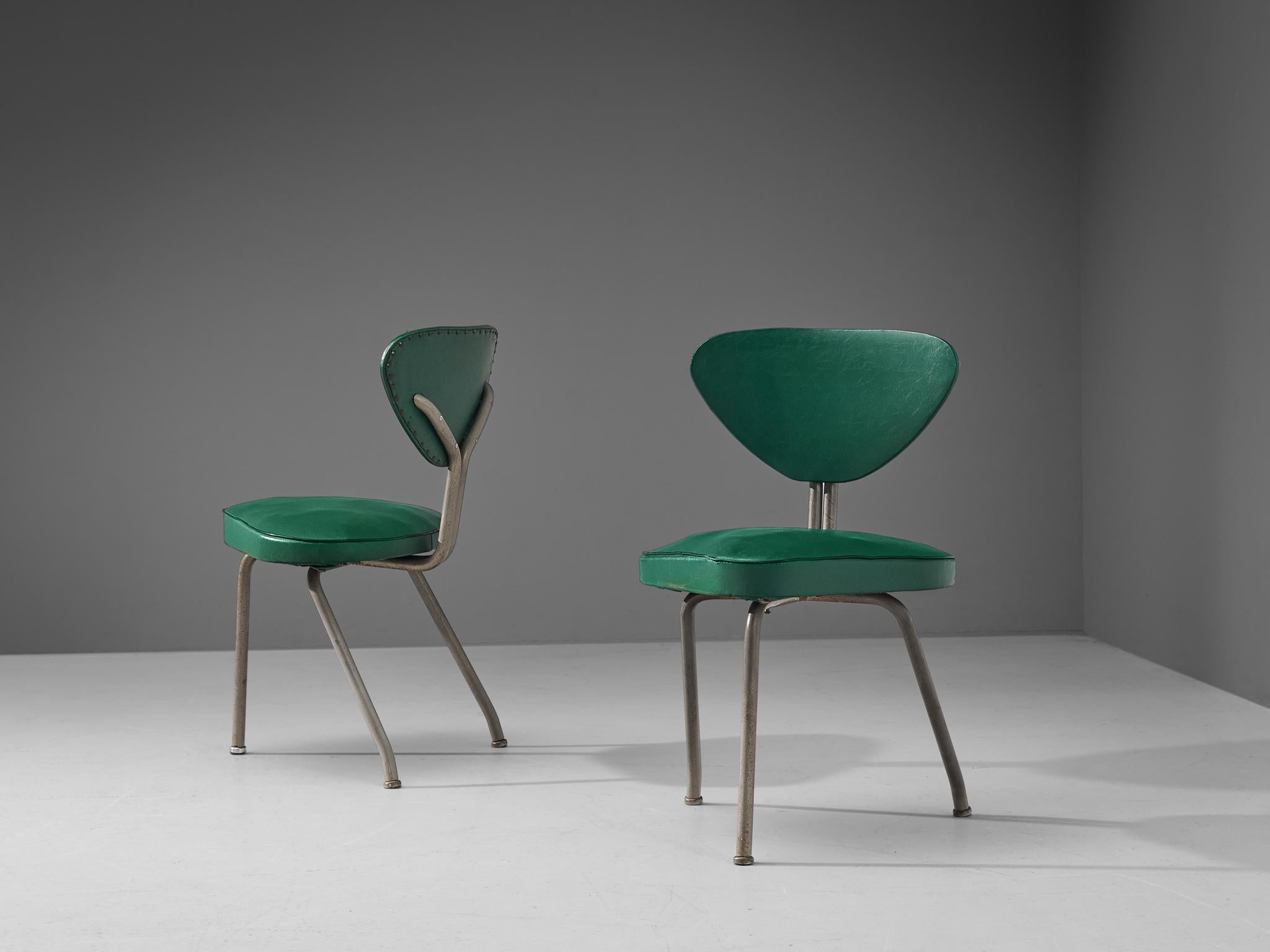 Pair of tripod chairs, steel, green leatherette, iron, Europe, 1960s. 

Pair of modest tripod chairs in green leatherette. These chairs feature a clear geometrical shape. Note for example the triangular shaped seating and backrest. The three steel