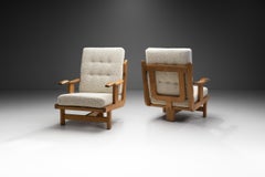 Pair of Tripod Lounge Chairs by Guillerme et Chambron, France 20th Century