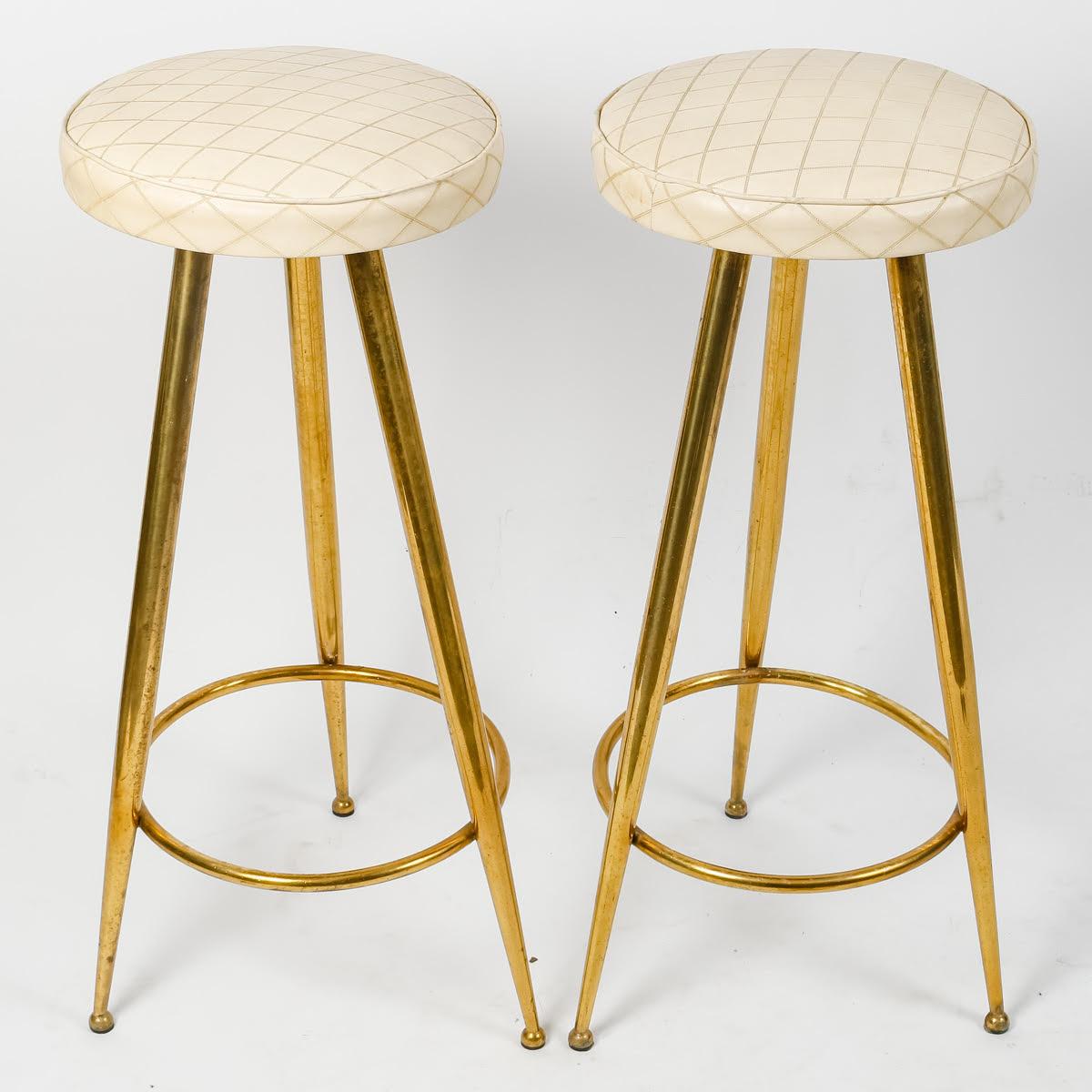 Pair of tripod stools by Gio Ponti (1891-1979).

Pair of brass barstools by Gio Ponti (1891-1979).
h: 80cm, d: 35cm