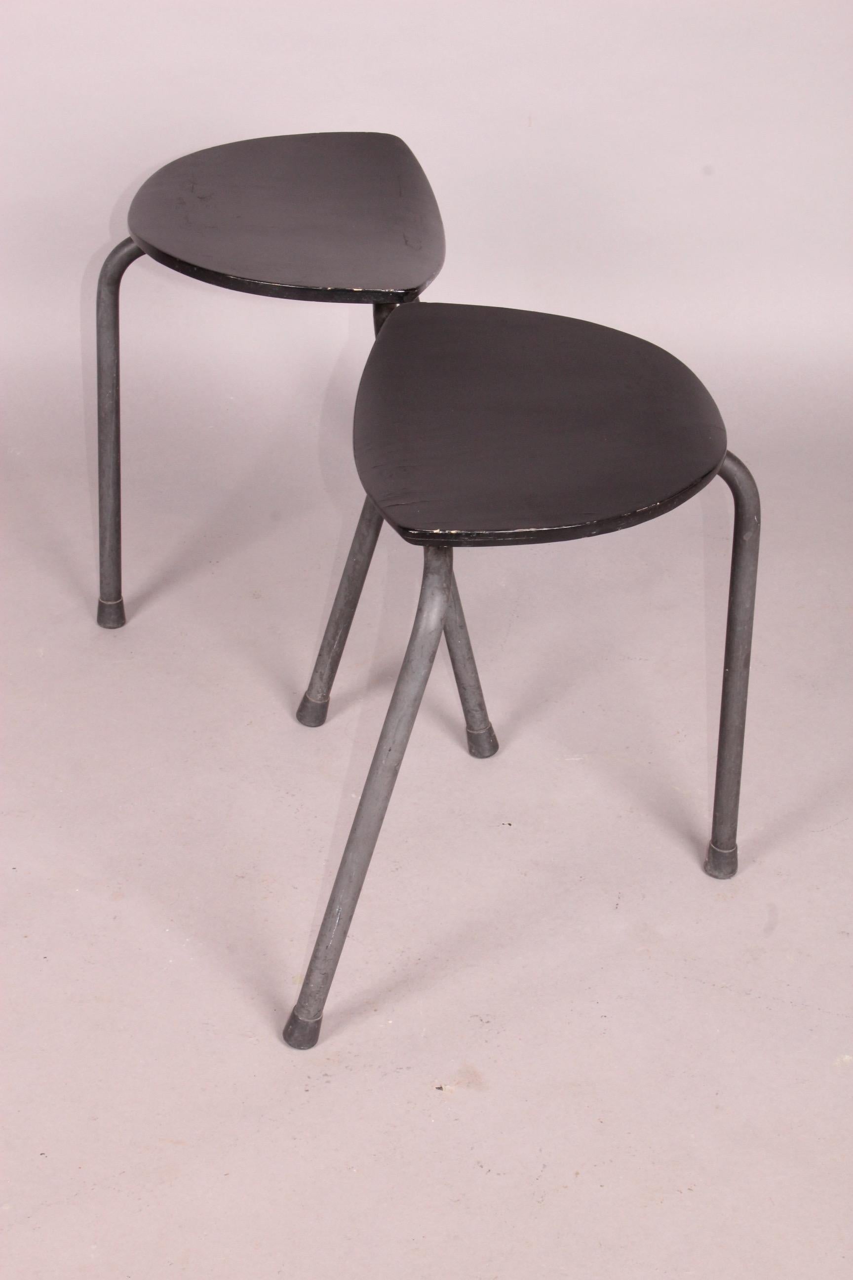 Pair of tripode stools, scratch on the top.