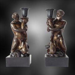 Pair of Triton Candlesticks. Palmer C1780.