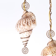 Pair of Triton Shell Pendants