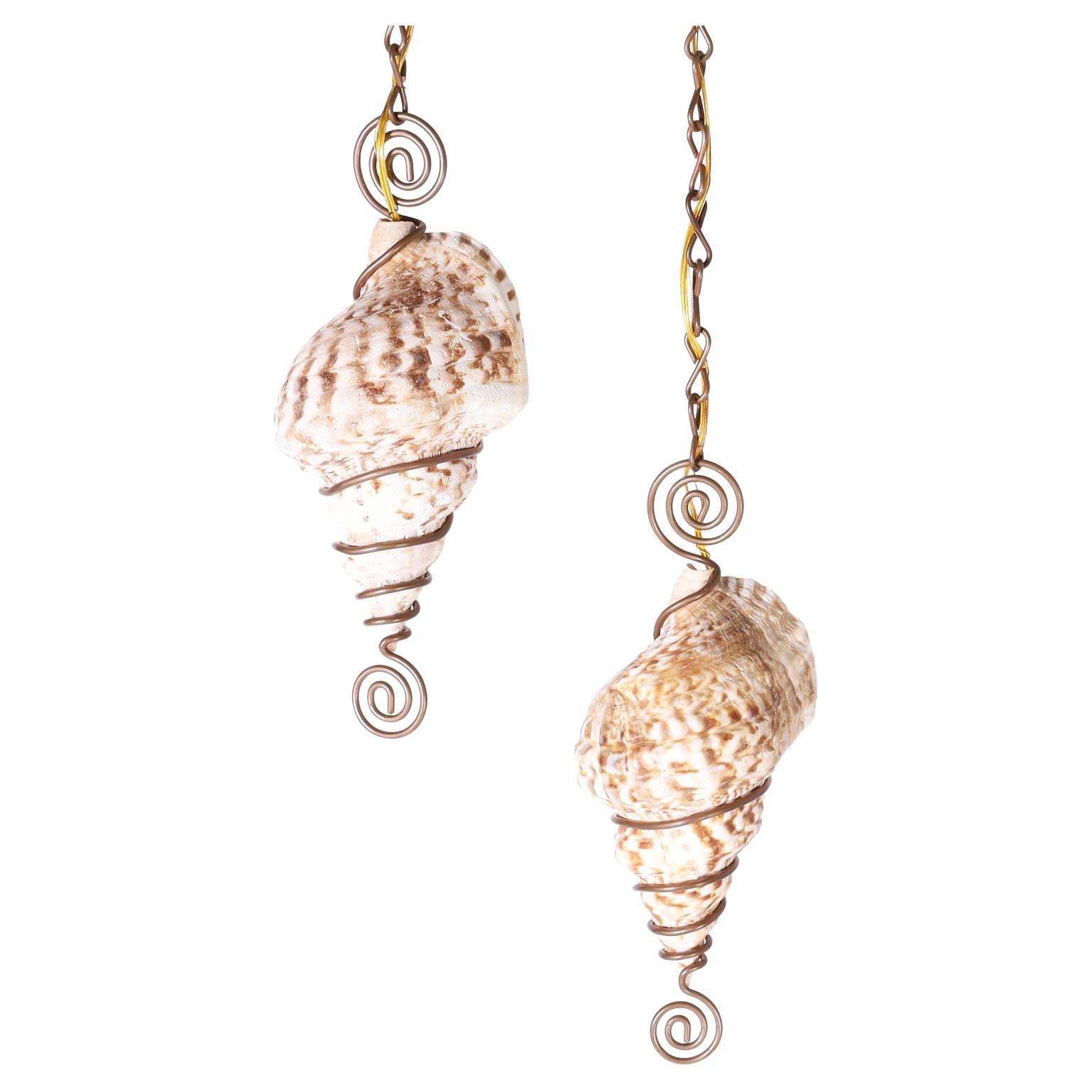 Pair of Triton Shell Pendants For Sale