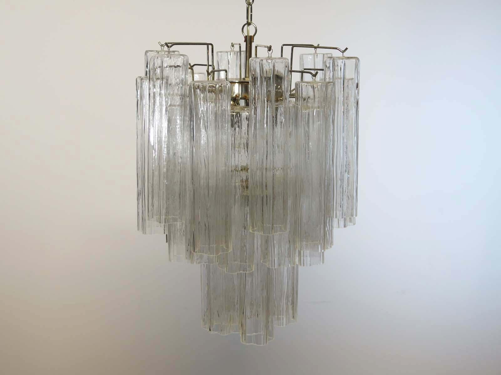 Pair of Italian vintage chandelier in Murano glass and nickel-plated metal structure. The armor polished nickel supports 30 large clear glass tubes in a star shape.
Period: 1960s
Dimensions: 47.25 inches (120 cm) height with chain, 24.80 inches (63