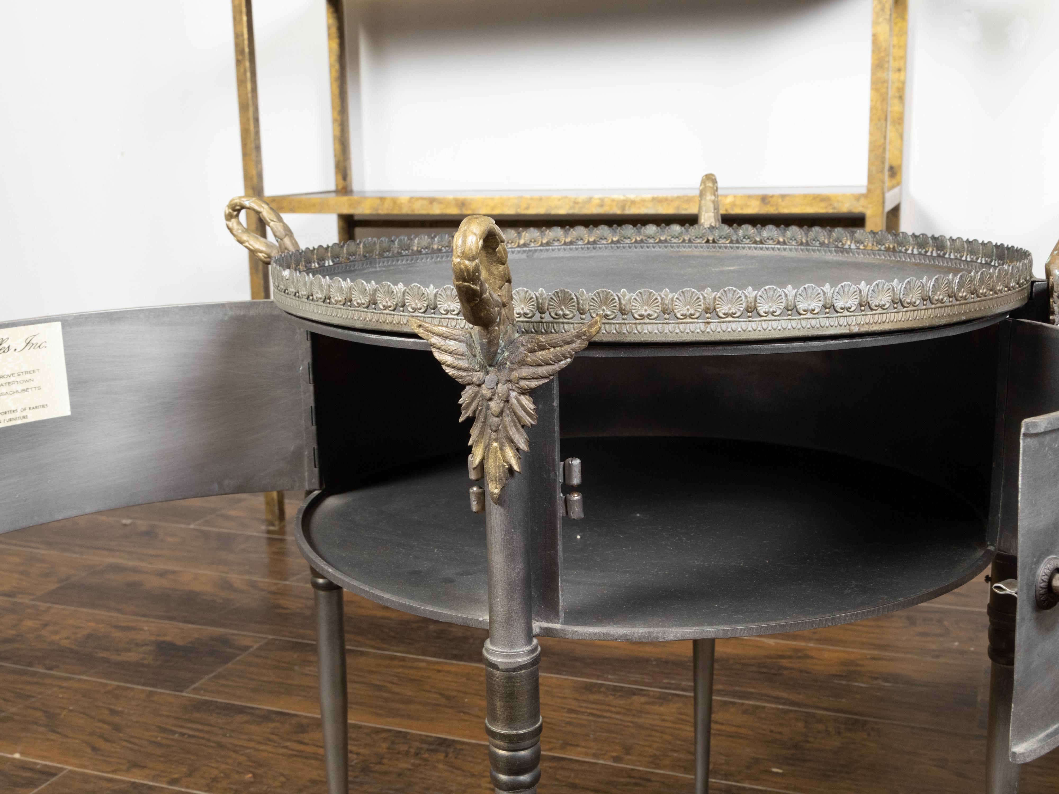 American Pair of Trouvailles Metal and Brass Side Tables with Swan Necks and Doors For Sale