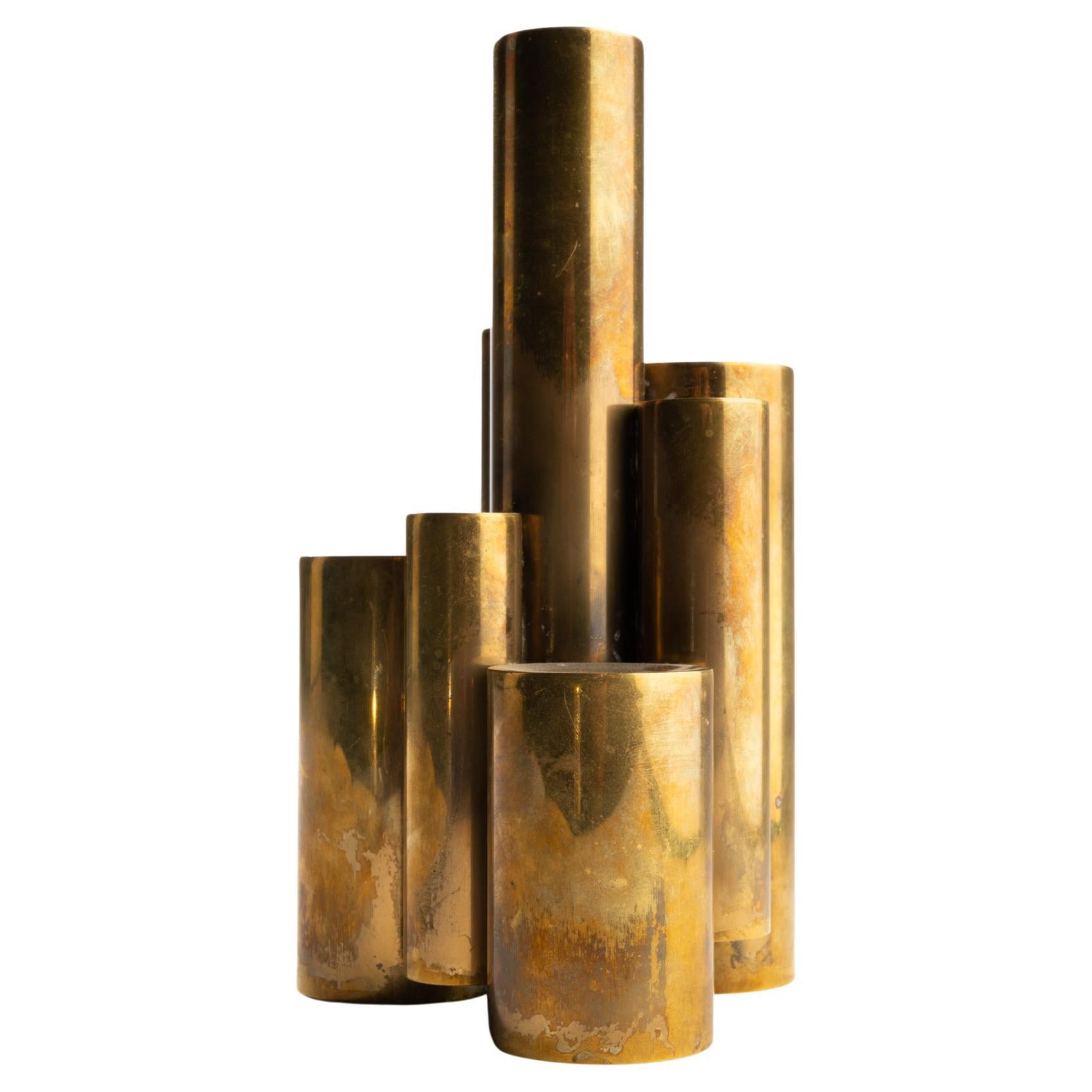 Gio Ponti is an Italian architect, designer, painter, author, teacher and director of publications.
Vintage polished brass tubular candlestick in the style of Gio Ponti. Elegant candleholder with cascade design for 8 candles with a 3/4