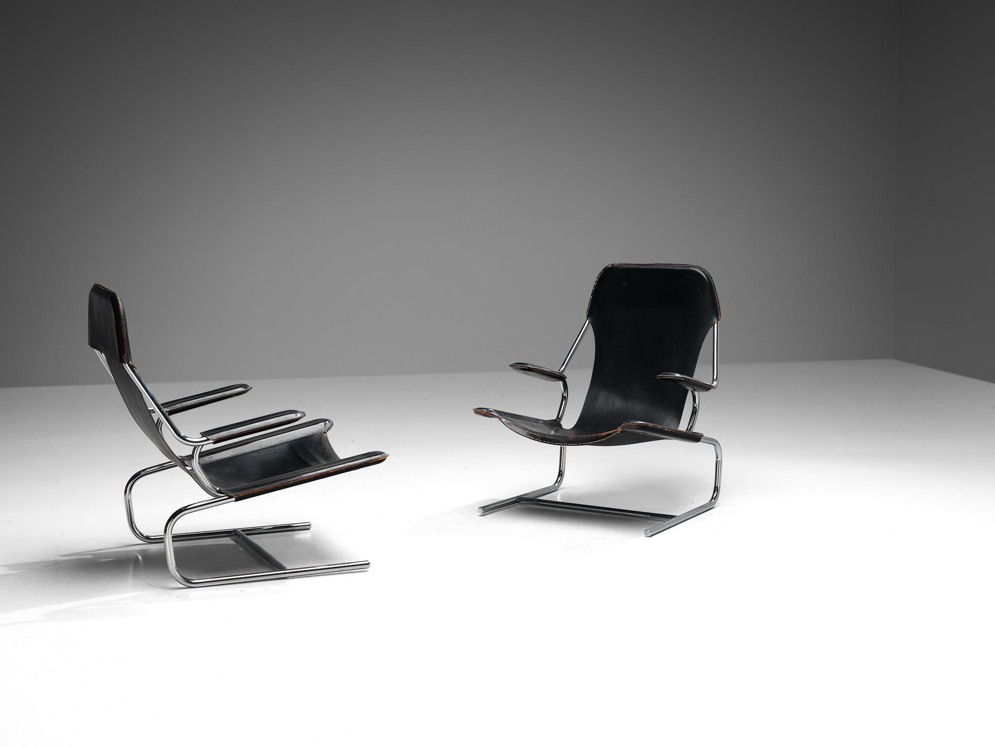 Modern Pair of Tubular Lounge Chairs and Ottoman in Black Leather For Sale