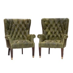 Pair of Tufted Green Leather Wing Chairs