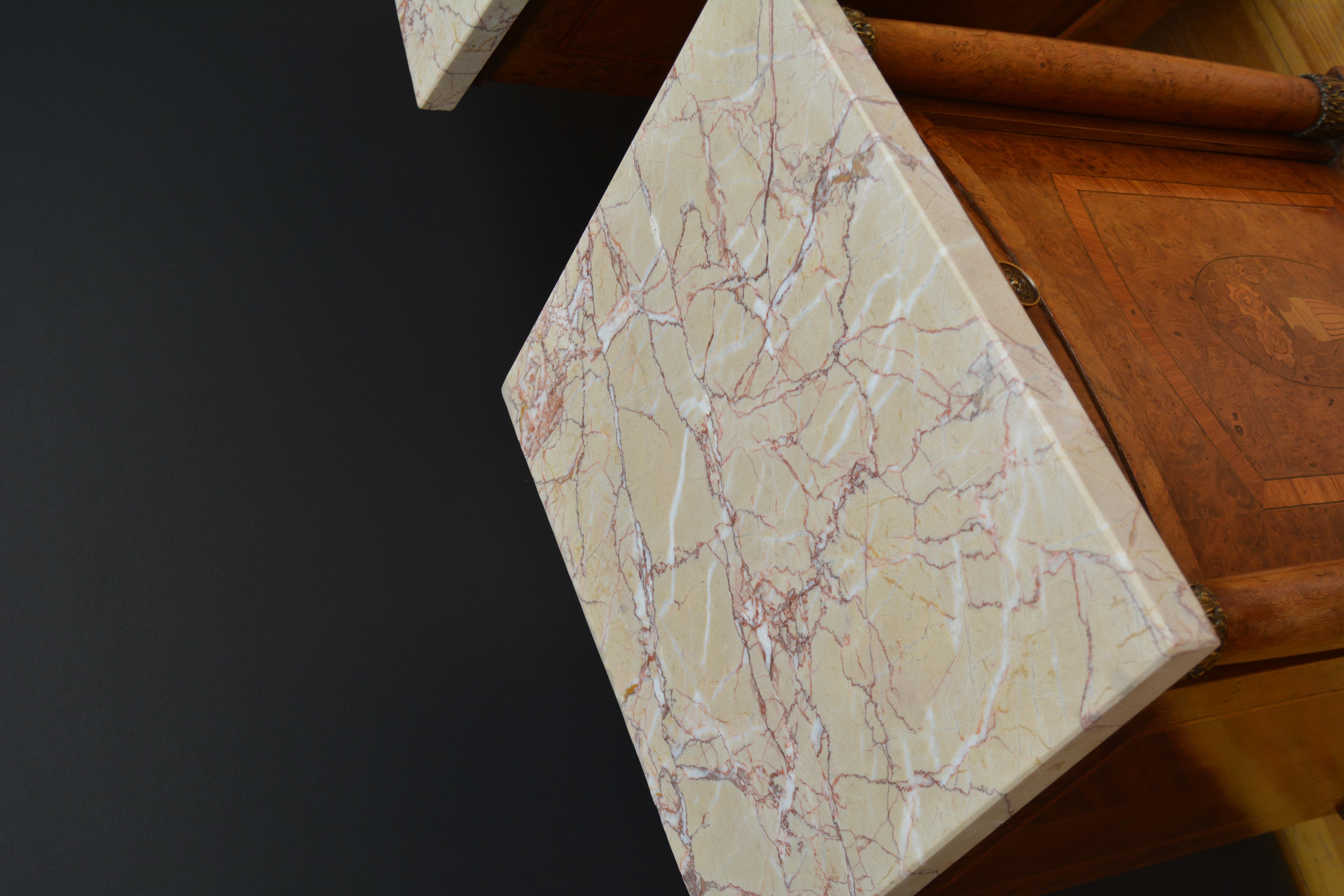 Sn5695 Pair of antique amboyna bedside cabinets of bow fronted design, each having attractive veined marble top above crossbanded drawer and finely inlaid doors enclosing storage space, all fitted with  brass handles all flanked by columns with
