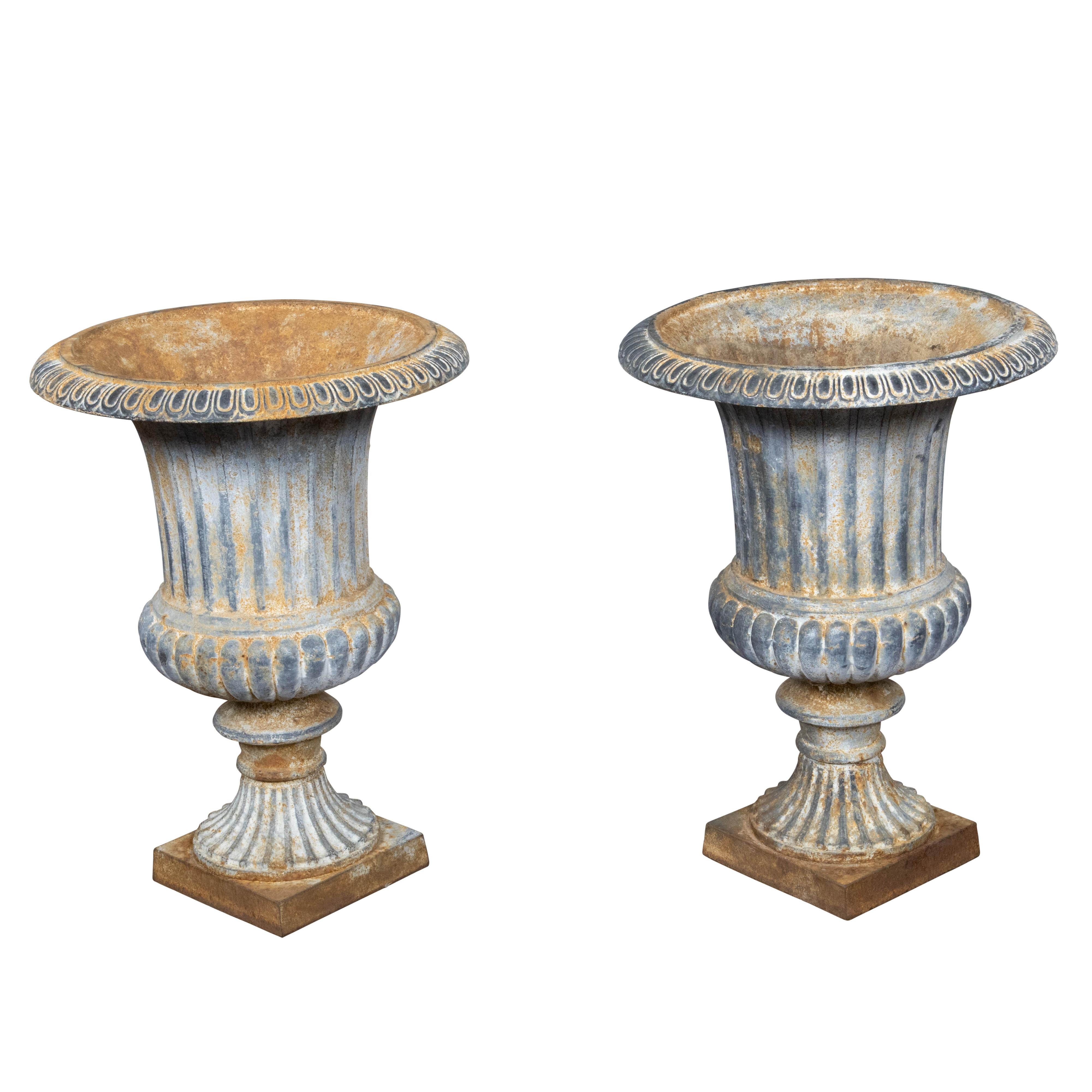 Pair of Turn of the Century French Medici Urn Cast Iron Planters with Patina For Sale 1