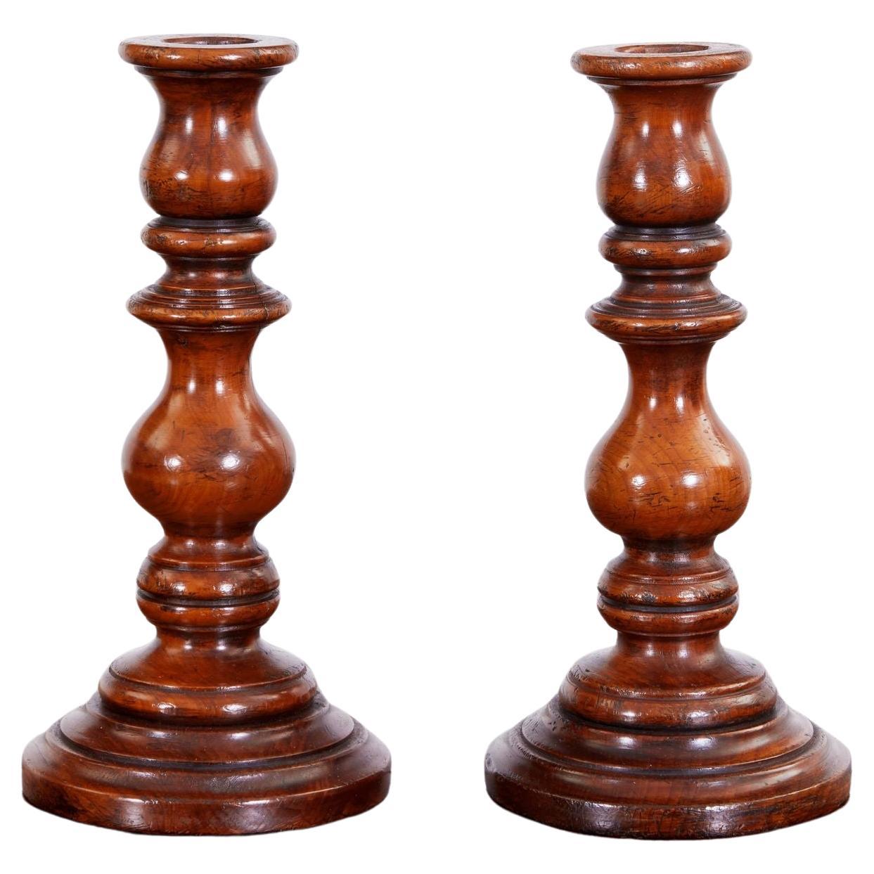Pair of Turned Fruitwood Candlesticks For Sale