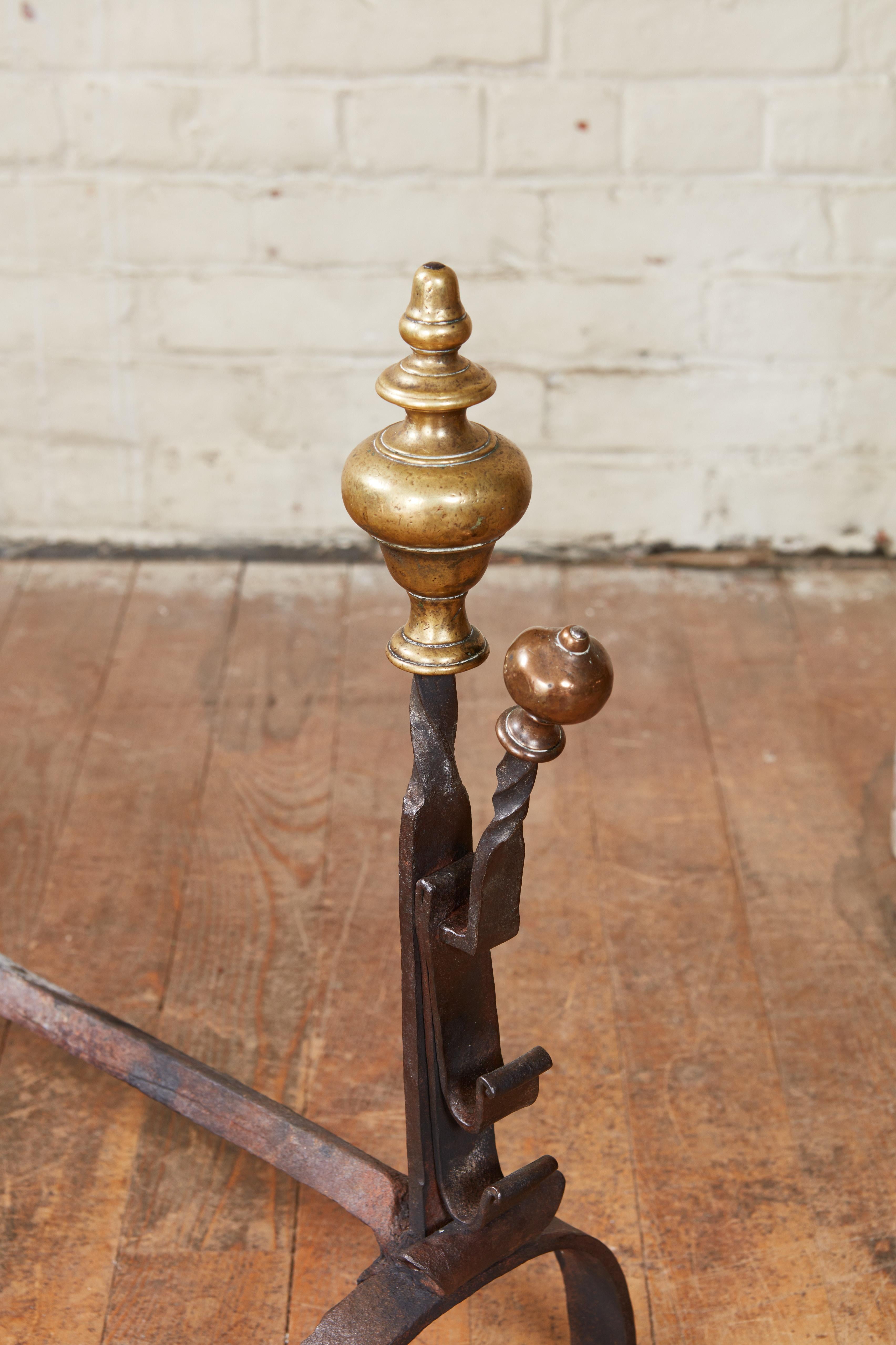 Forged Pair of Turned Steeple Top Andirons For Sale