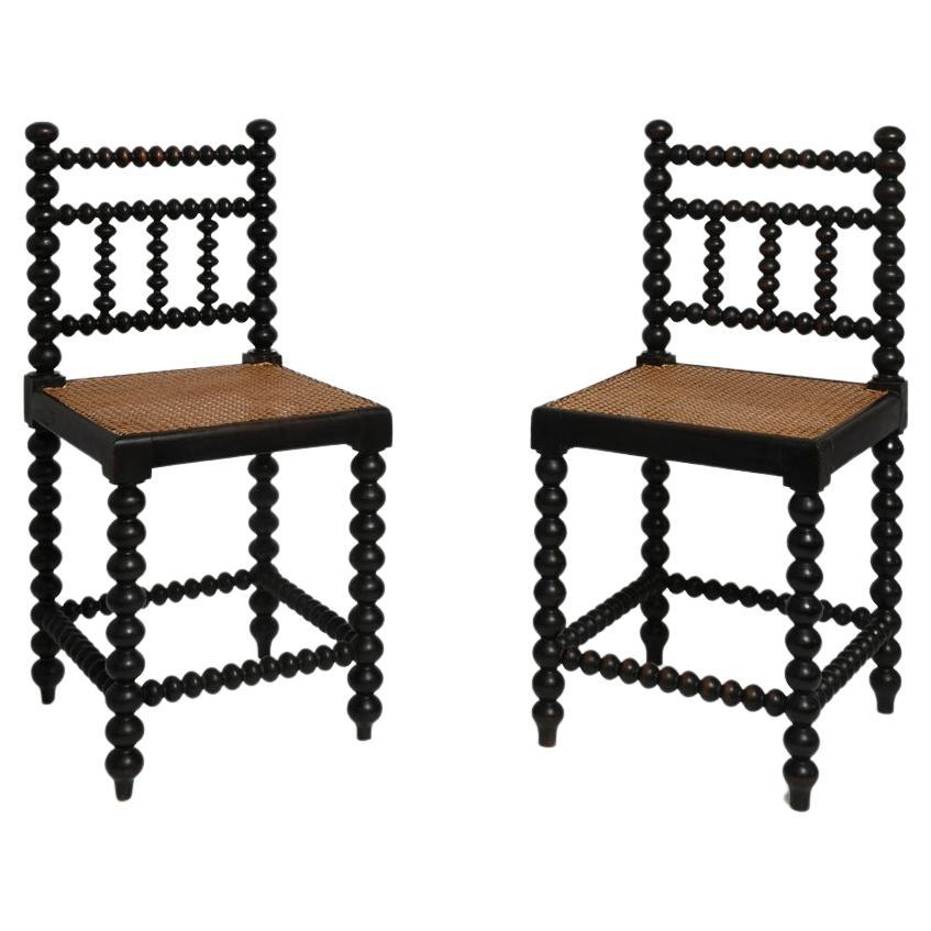 Pair of turned wood and caning chairs, 1910s. For Sale