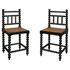 Antique Pair of turned wood and caning chairs, 1910s.