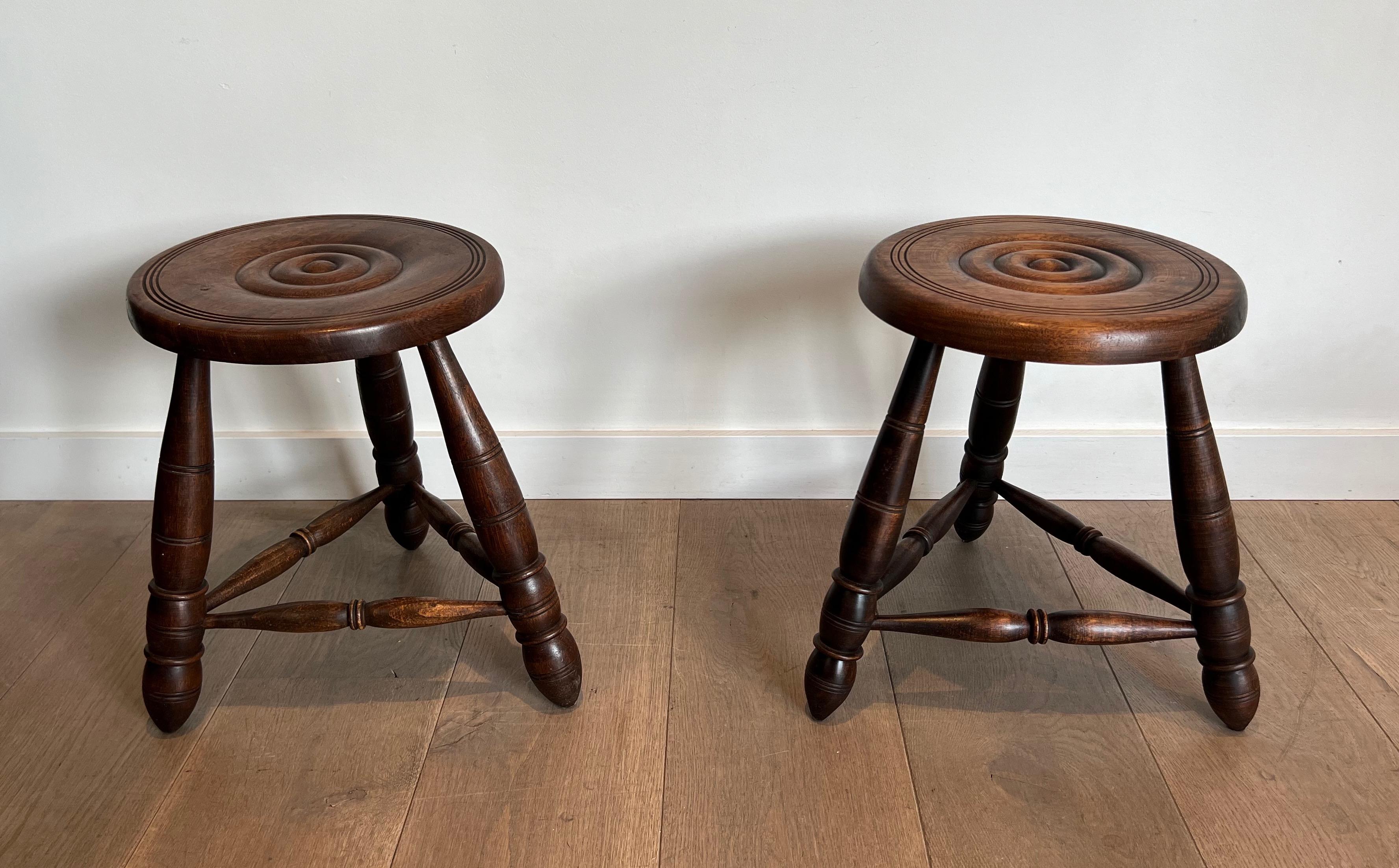 This very nice pair of stools are made of turned wood. This is a very nice design and a French work attributed to Charles Dudouyt, circa 1950.