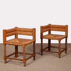 Pair of turned wooden straw-covered corner chairs, 1940